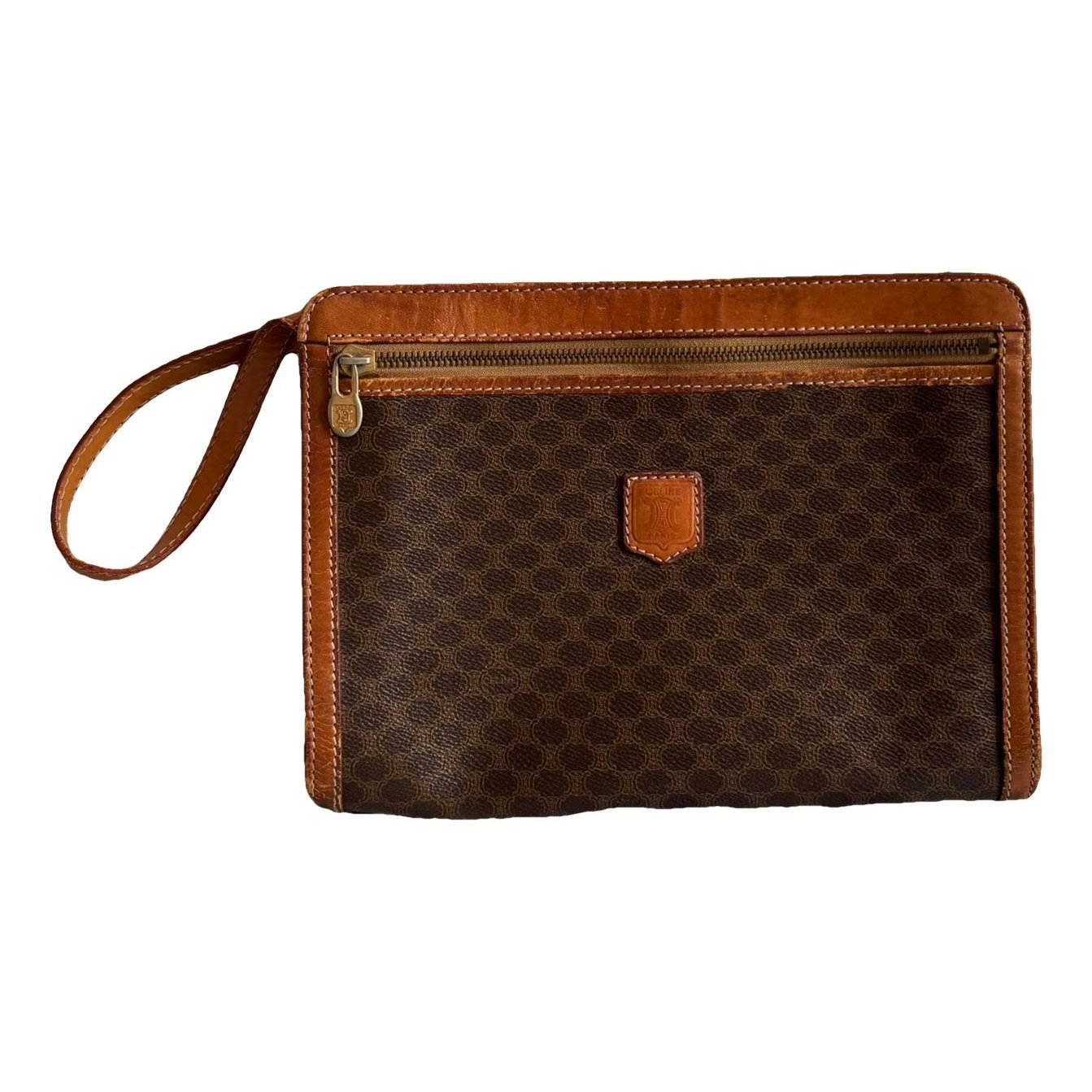 Triomphe Vintage leather clutch bag