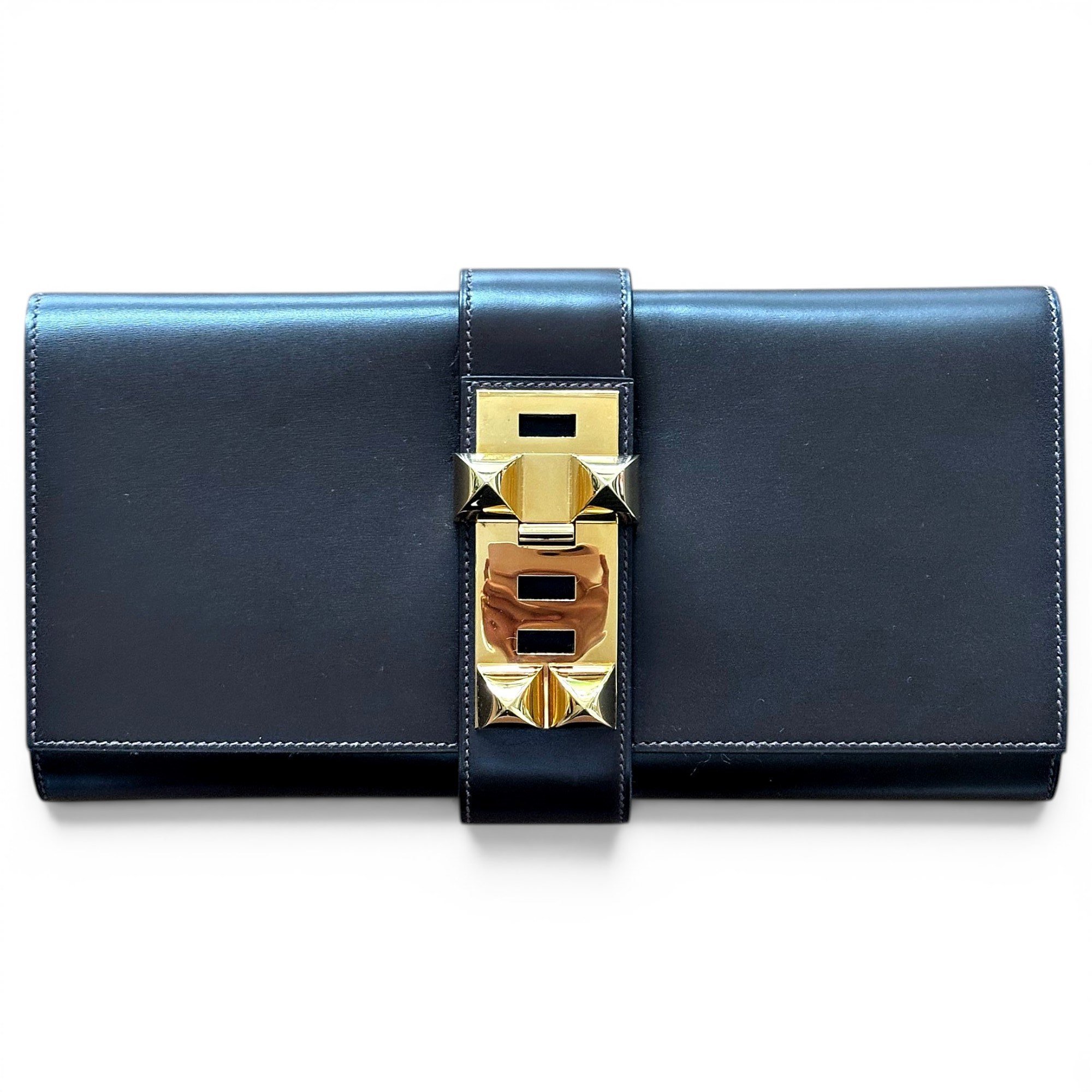 Médor leather clutch bag