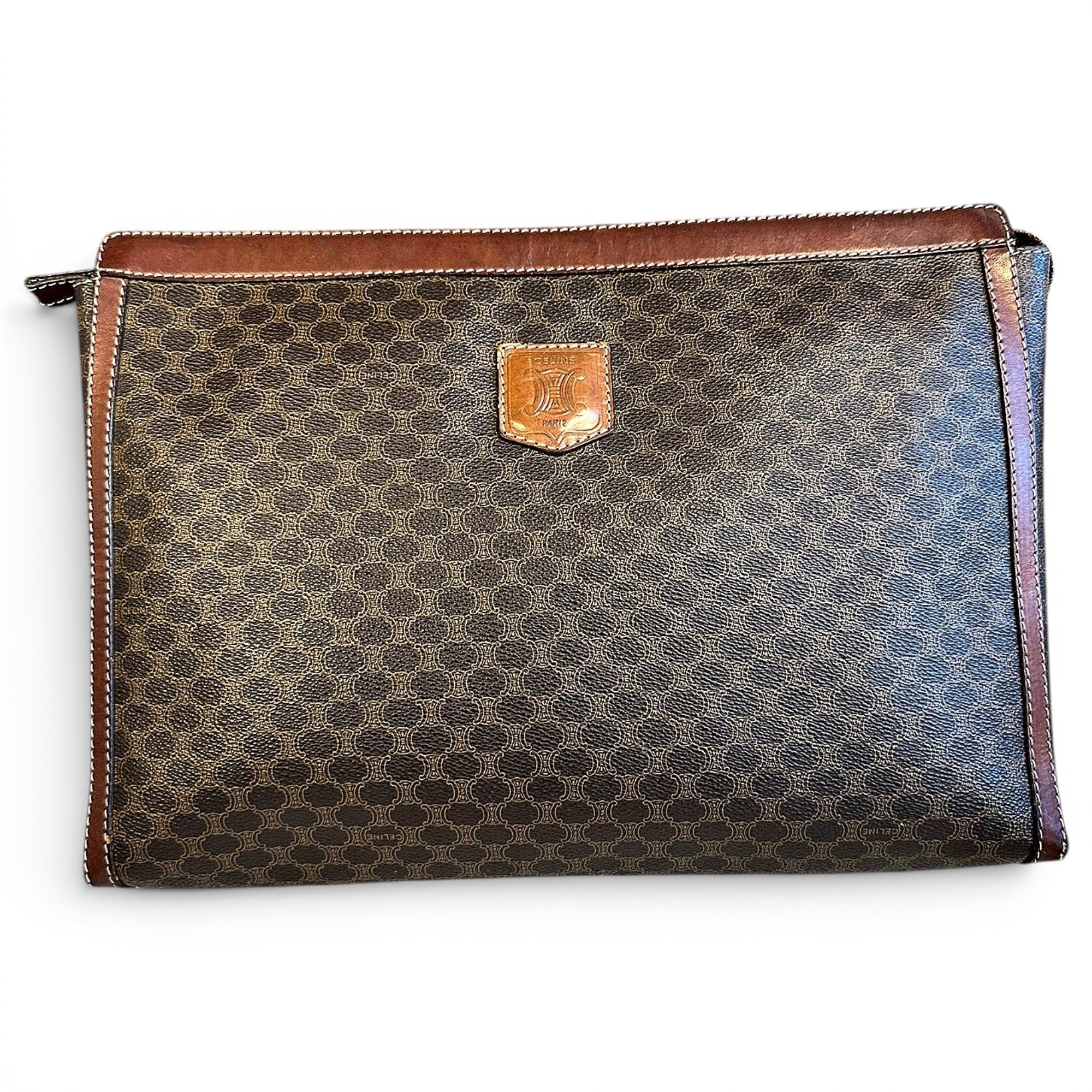 Triomphe Vintage leather clutch bag