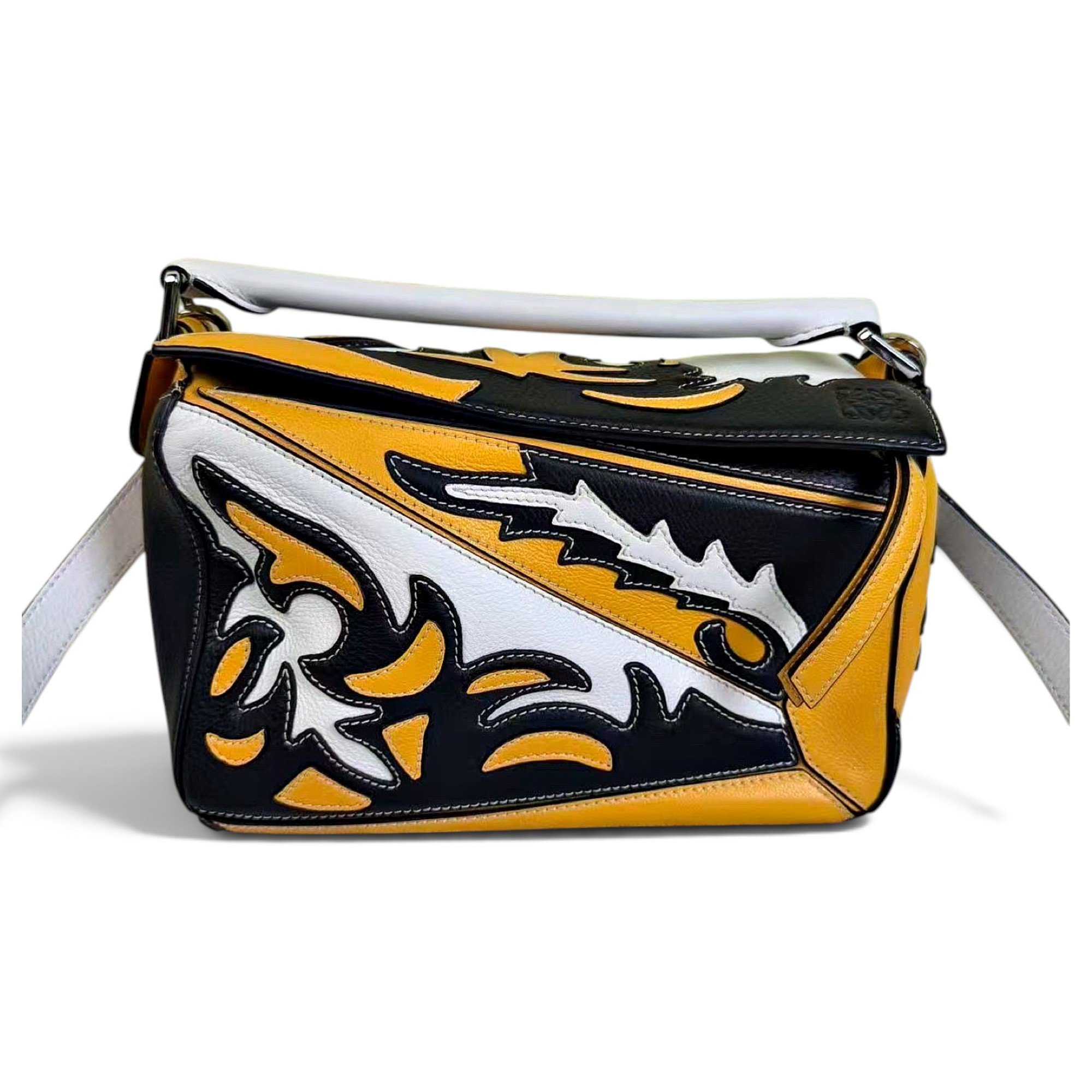 Puzzle leather handbag