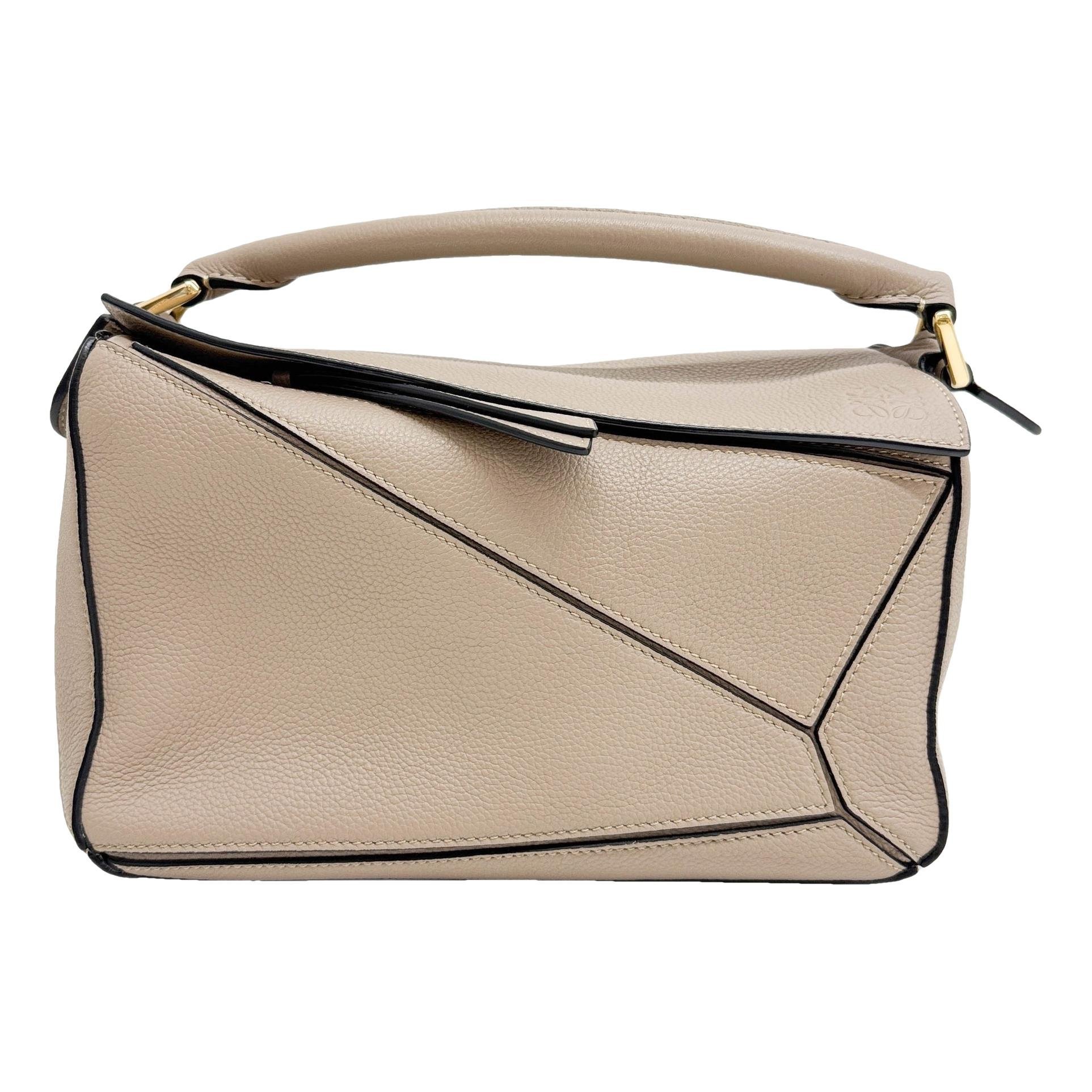 Puzzle leather handbag