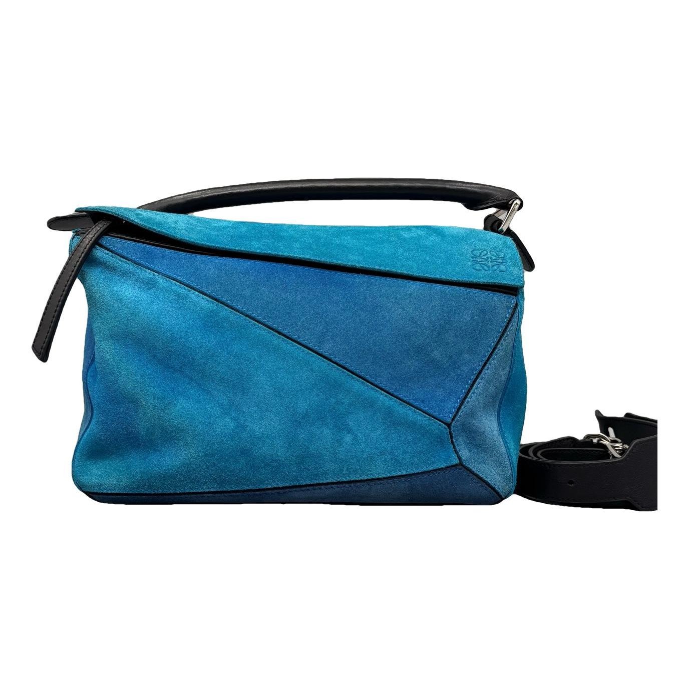 Puzzle leather handbag