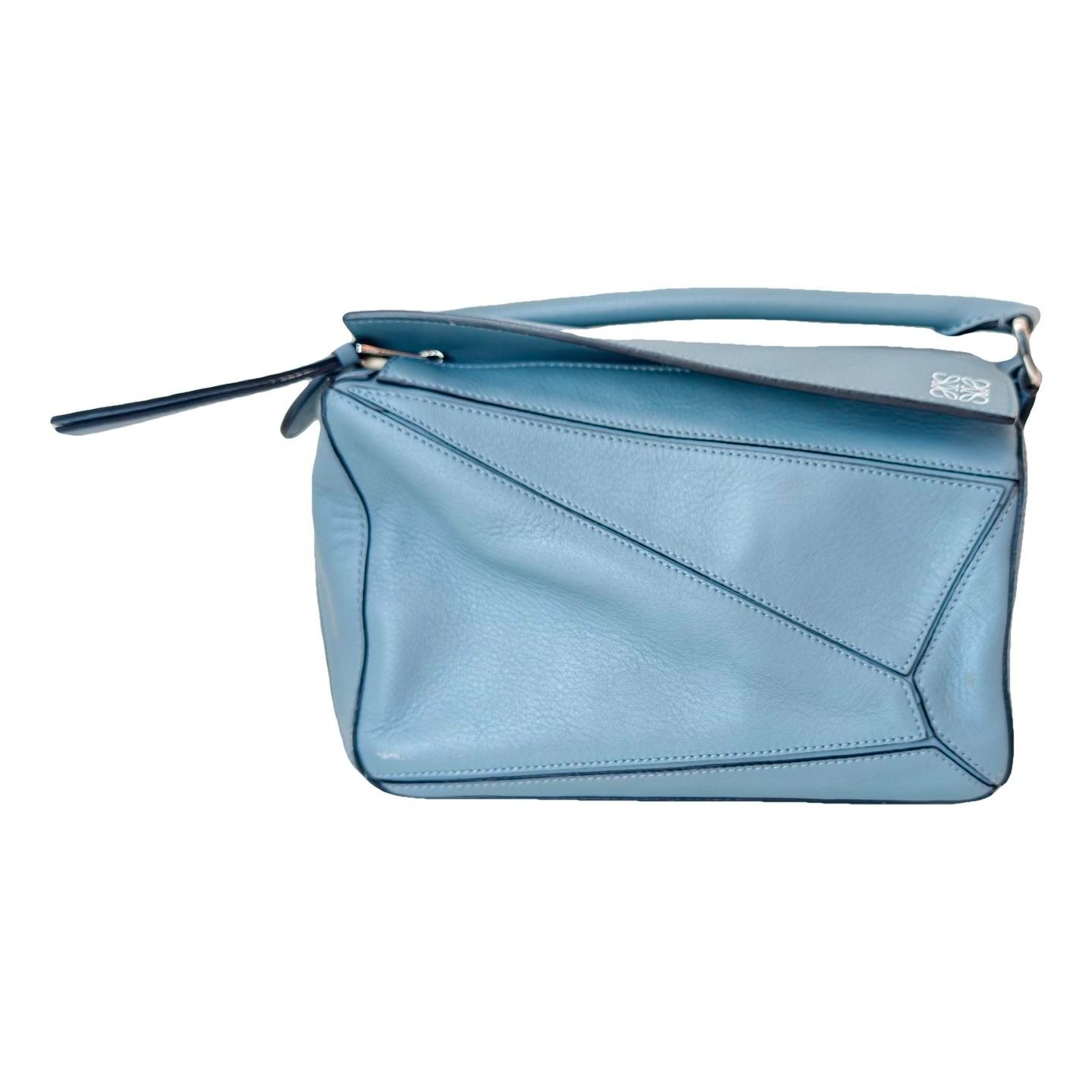 Puzzle leather handbag