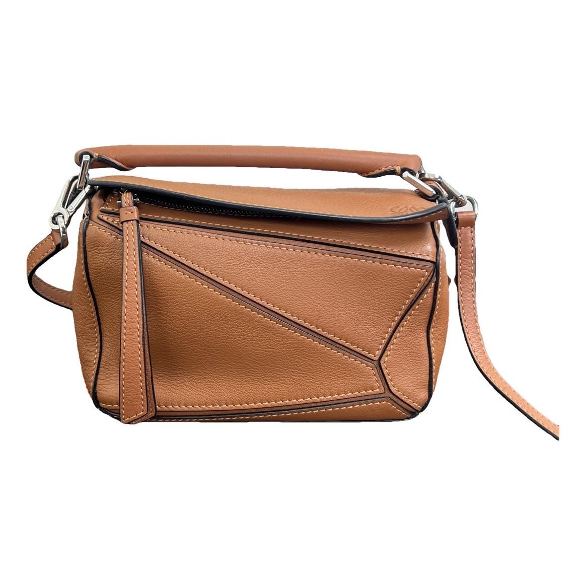 Puzzle leather handbag
