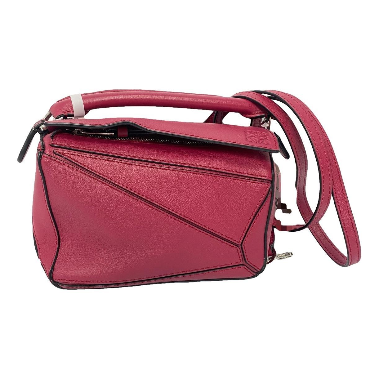 Puzzle leather handbag
