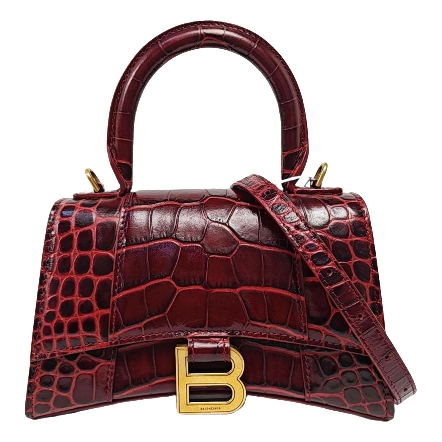 Hourglass leather handbag