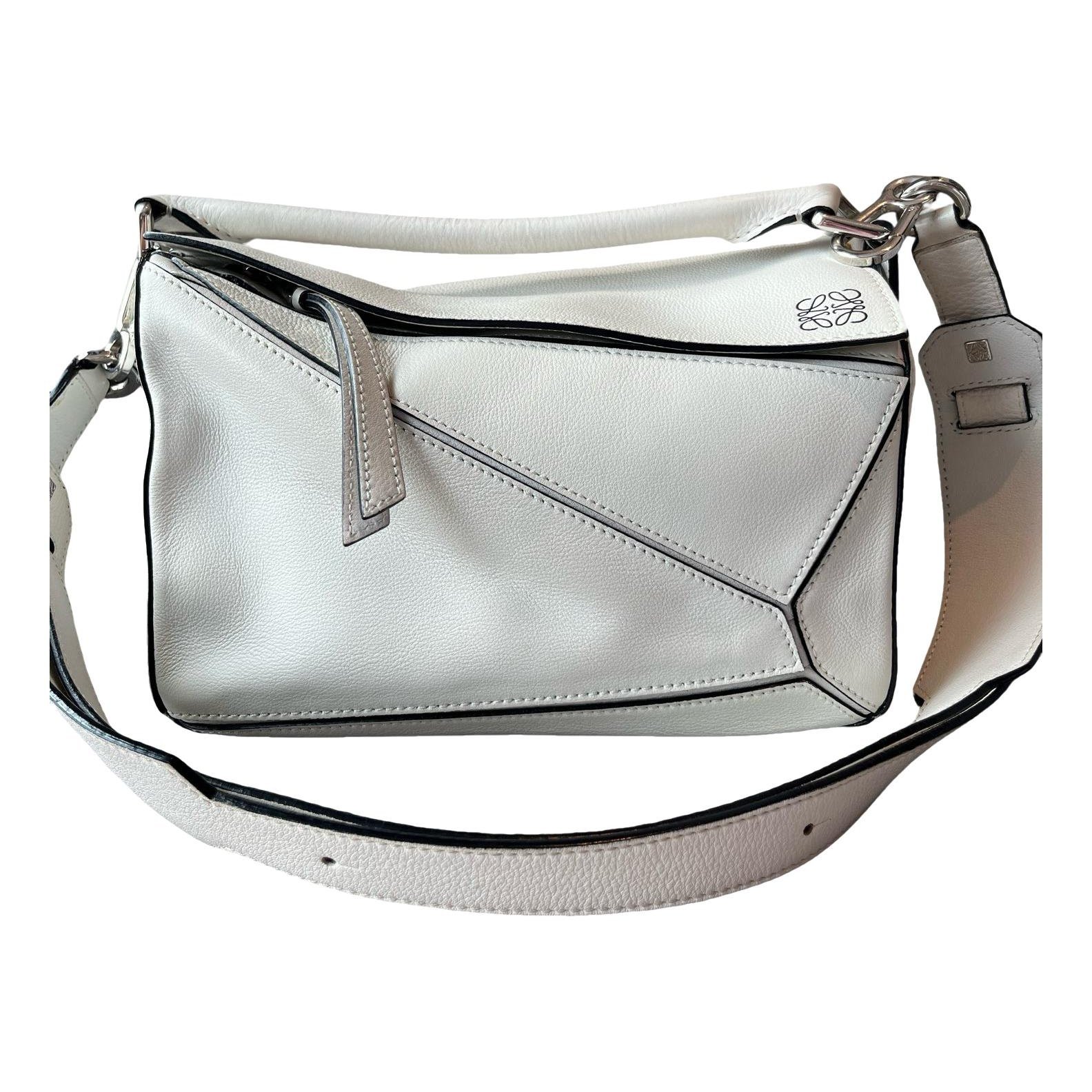 Puzzle leather handbag