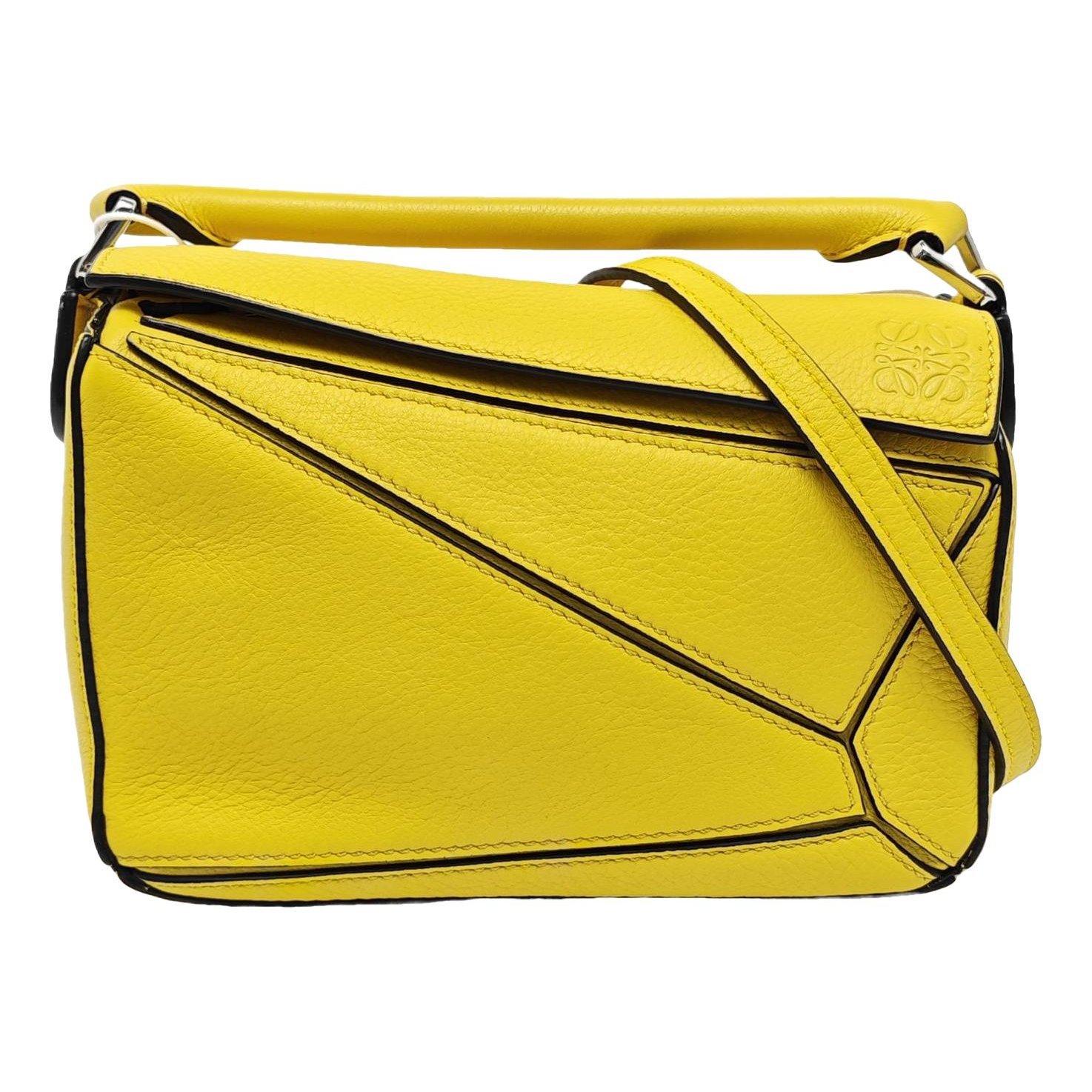 Puzzle leather handbag