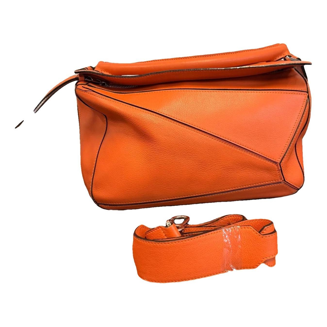 Puzzle leather crossbody bag
