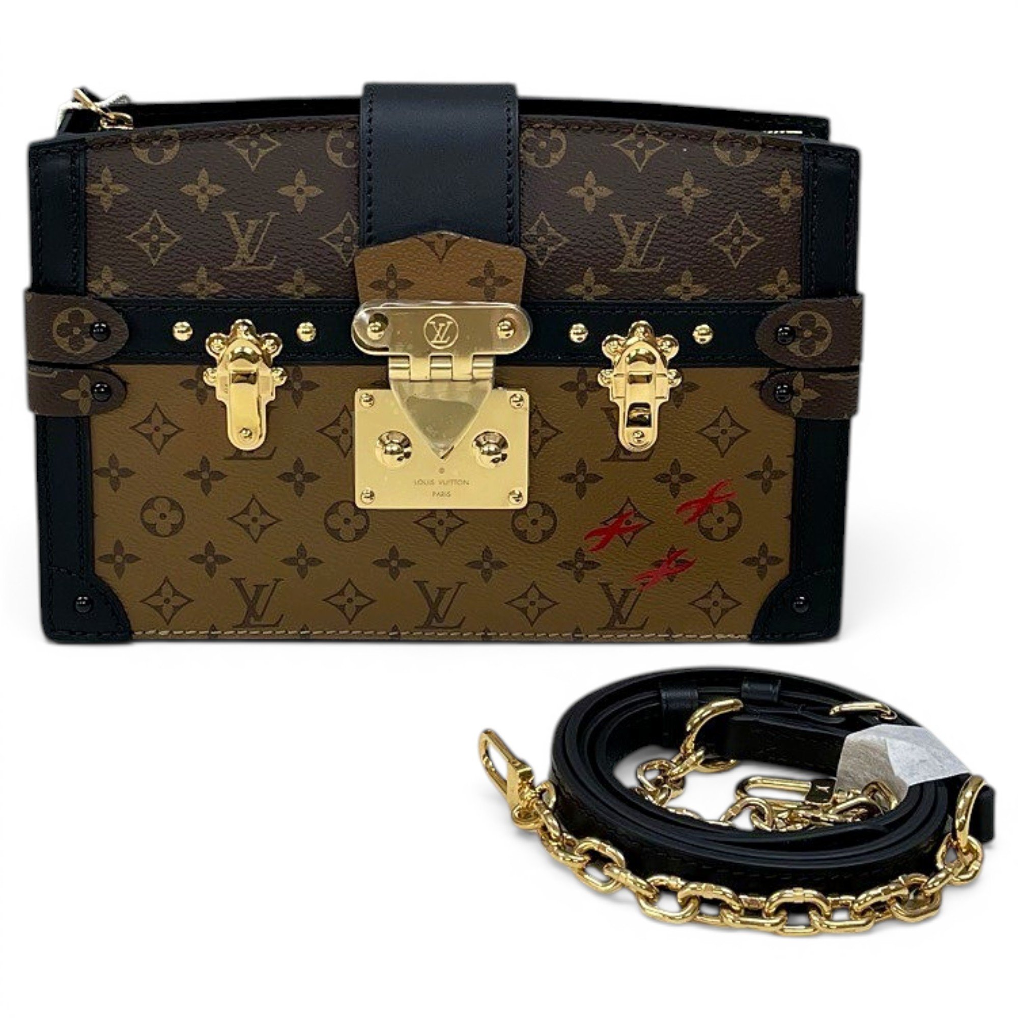 Pochette Trunk leather handbag