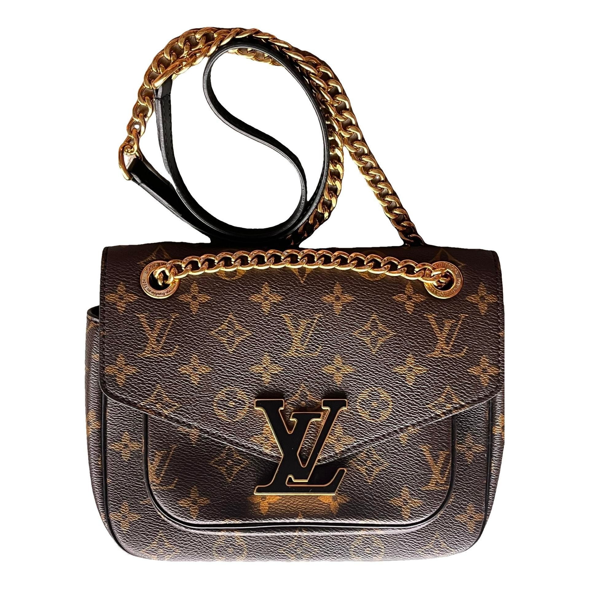Louis Vuitton Passy cloth handbag