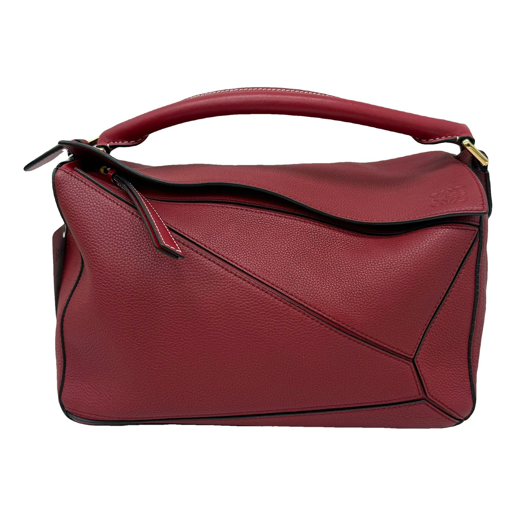Puzzle leather handbag