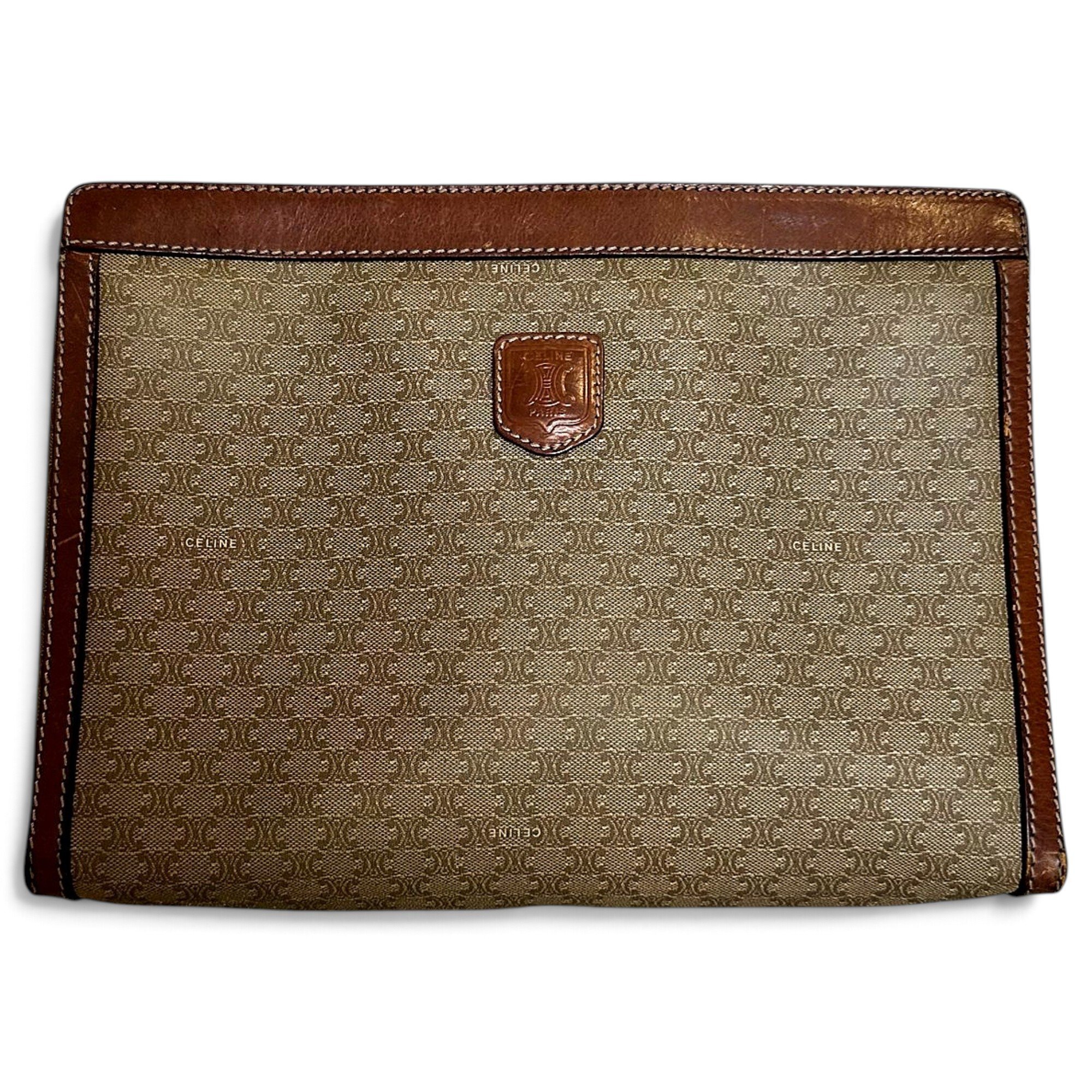 Triomphe Vintage leather clutch bag