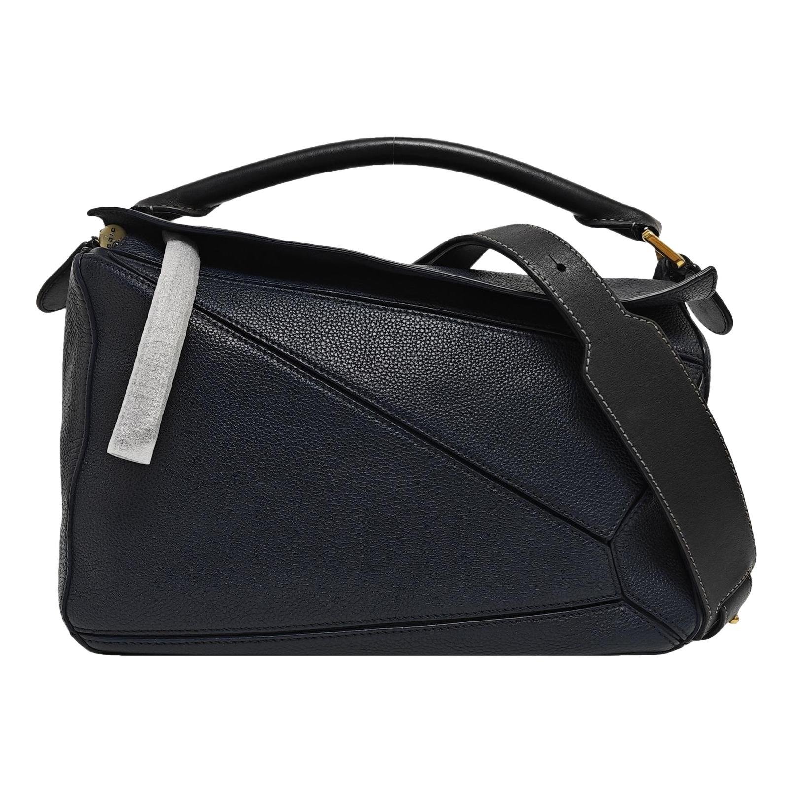 Puzzle leather handbag