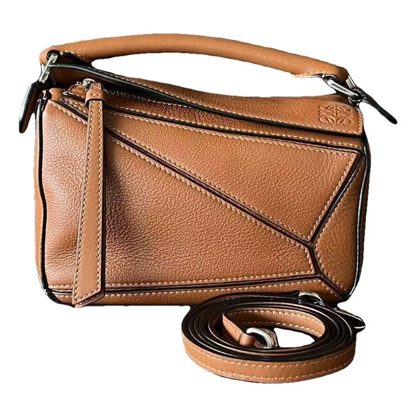 Puzzle leather handbag