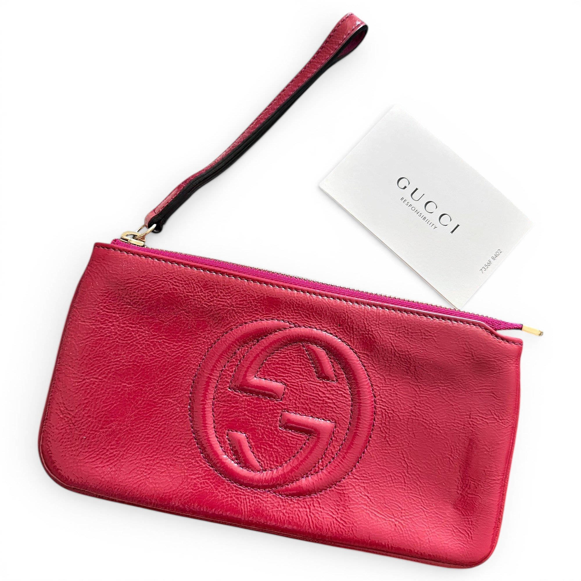 Soho patent leather clutch bag