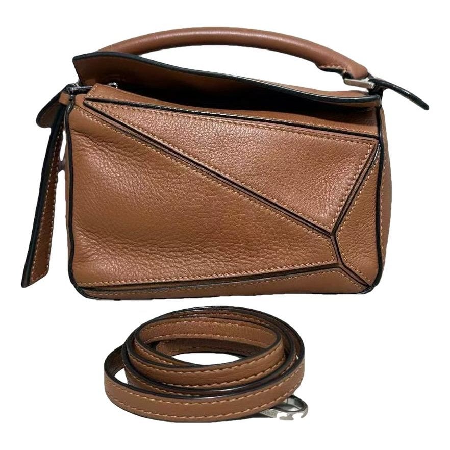 Puzzle leather handbag