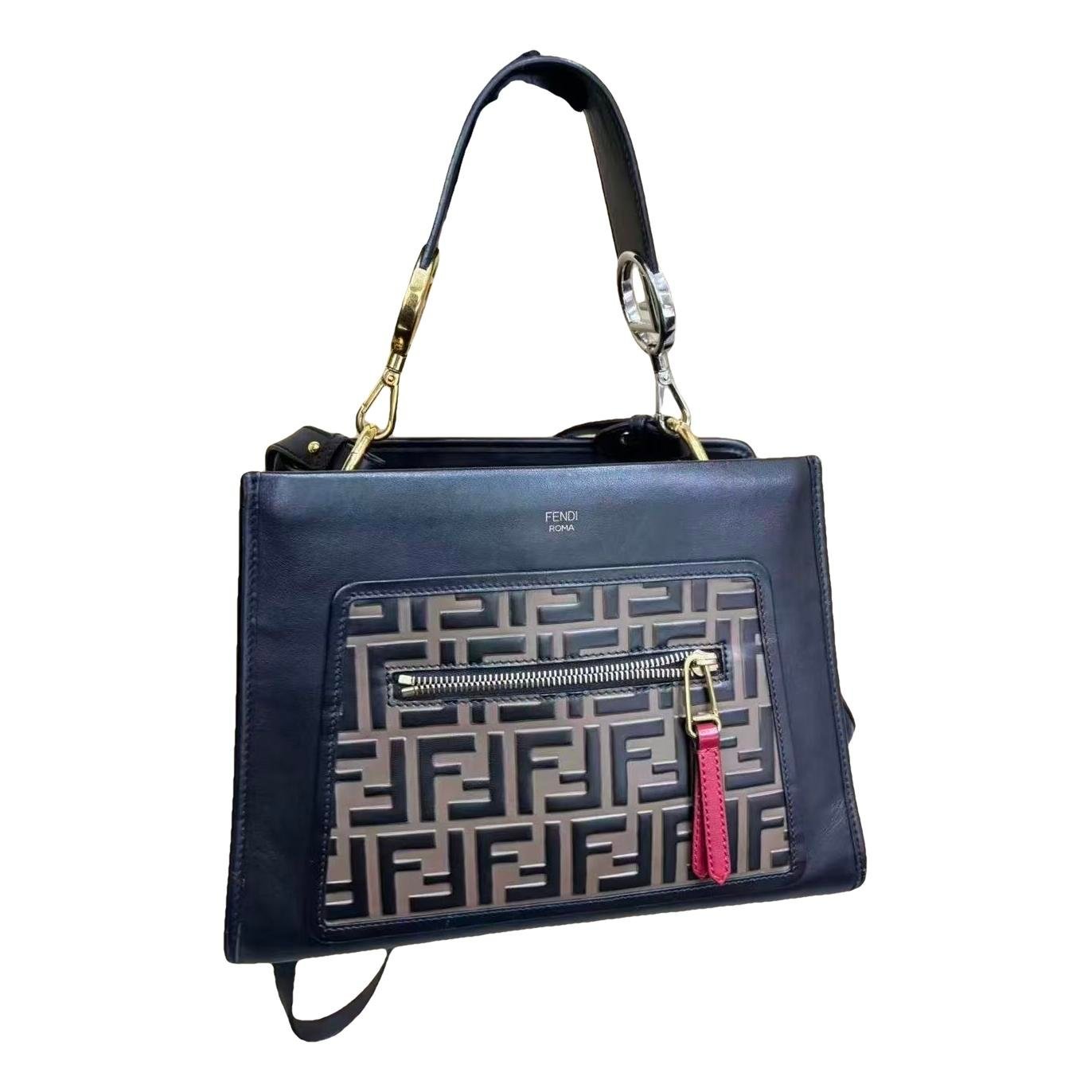 Runaway leather handbag