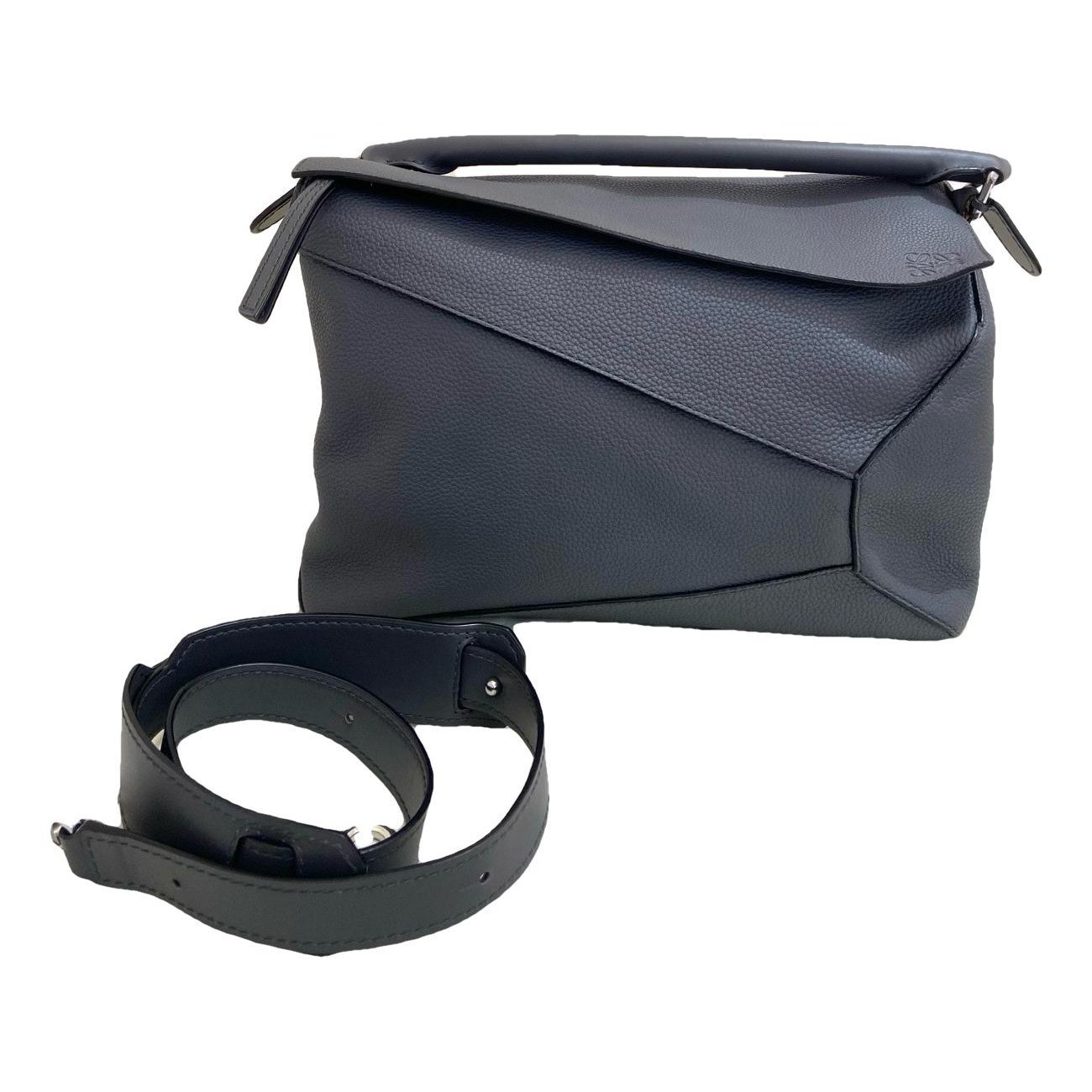 Puzzle leather handbag