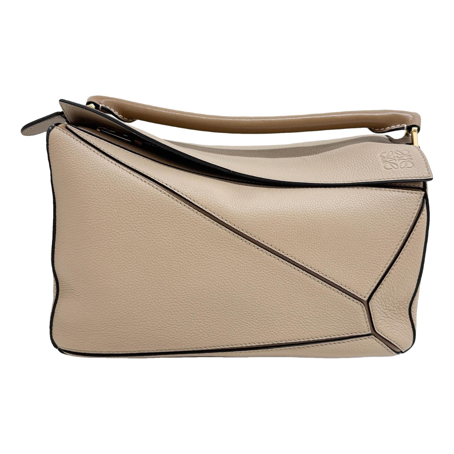 Puzzle leather handbag