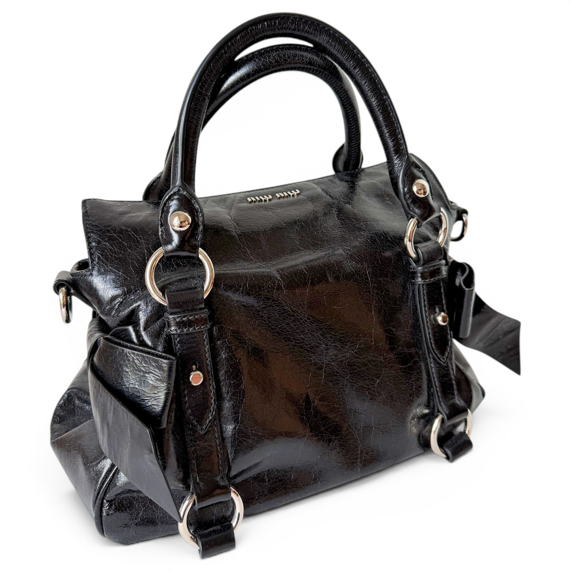 Bow bag leather handbag