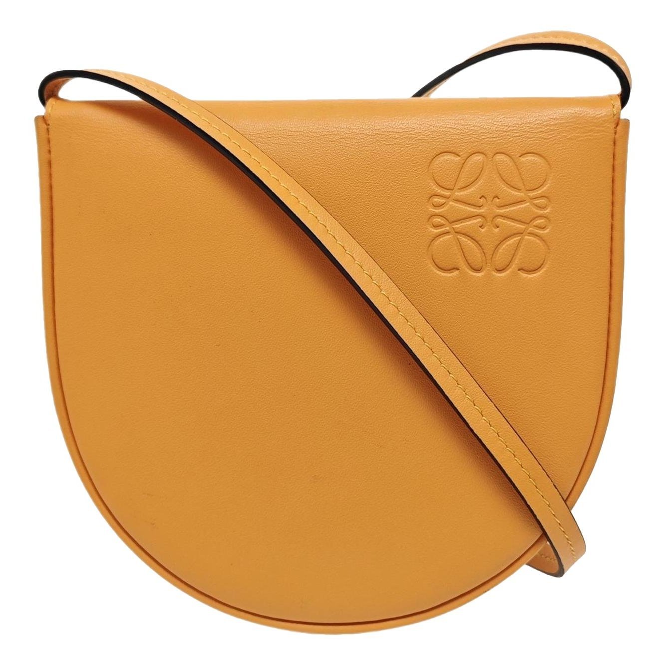 Heel leather handbag