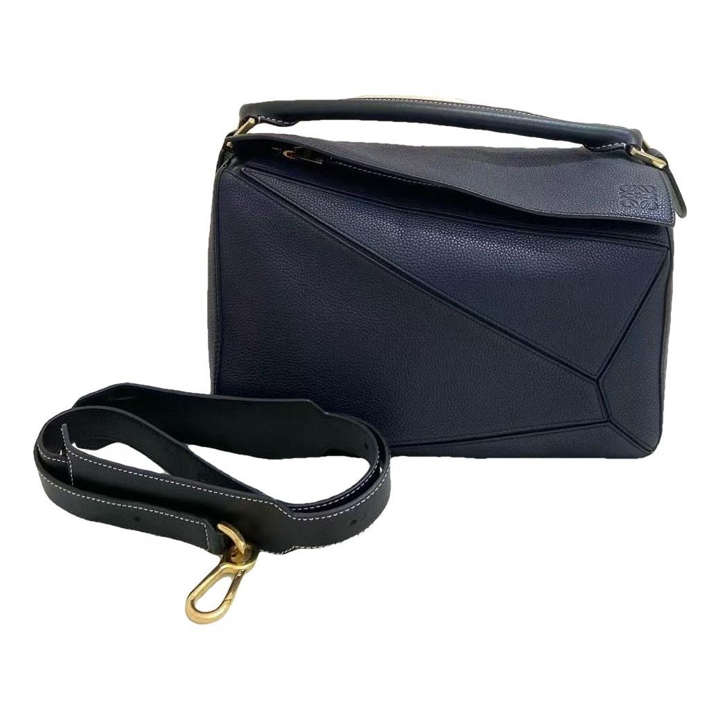 Puzzle leather handbag