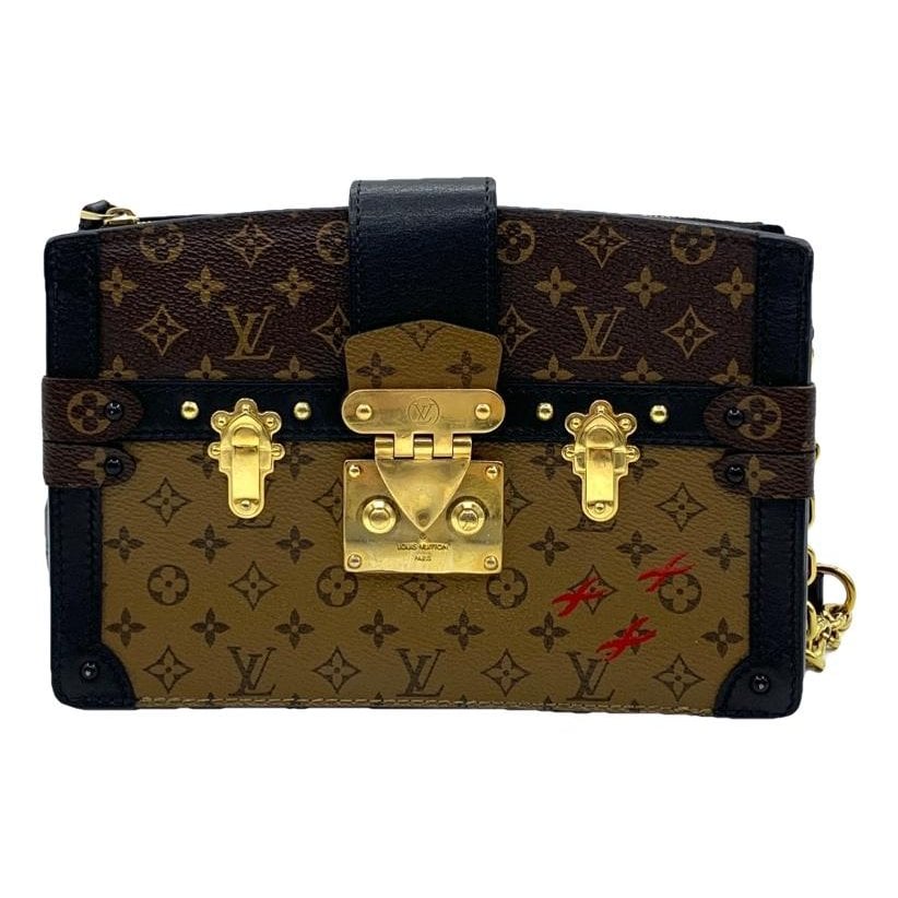 Pochette Trunk leather handbag