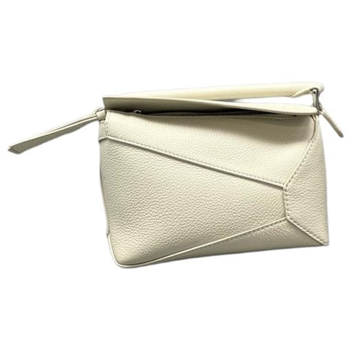 Puzzle leather handbag