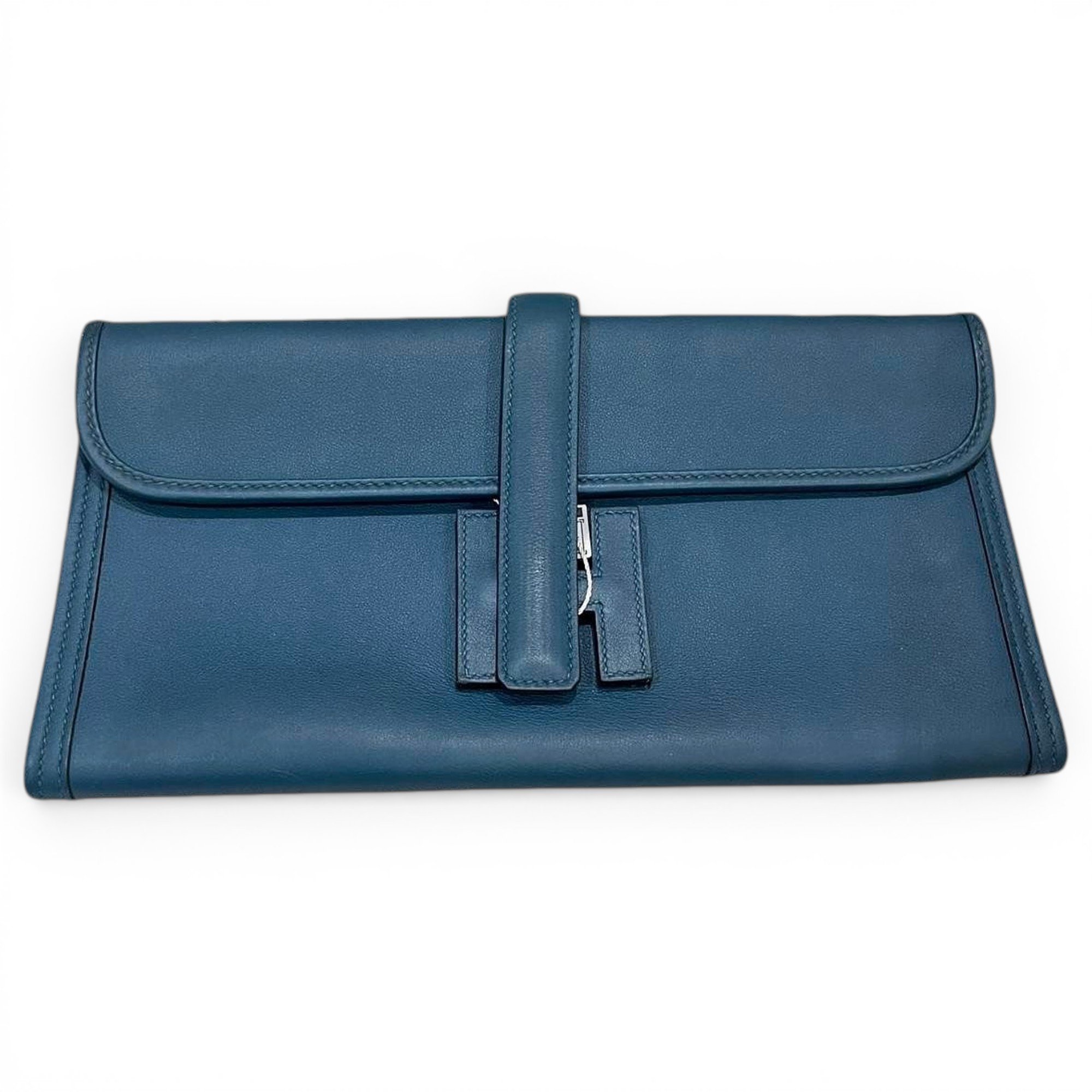 Jige leather clutch bag
