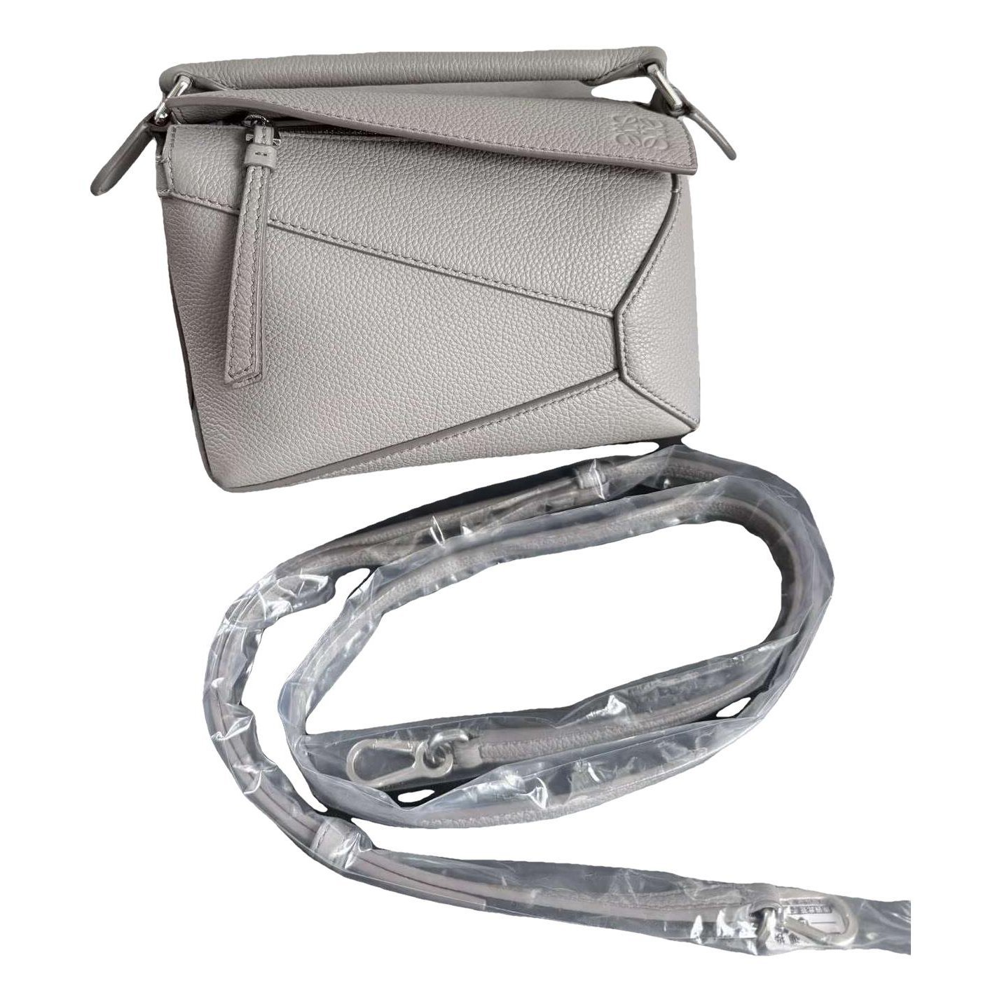 Puzzle leather handbag