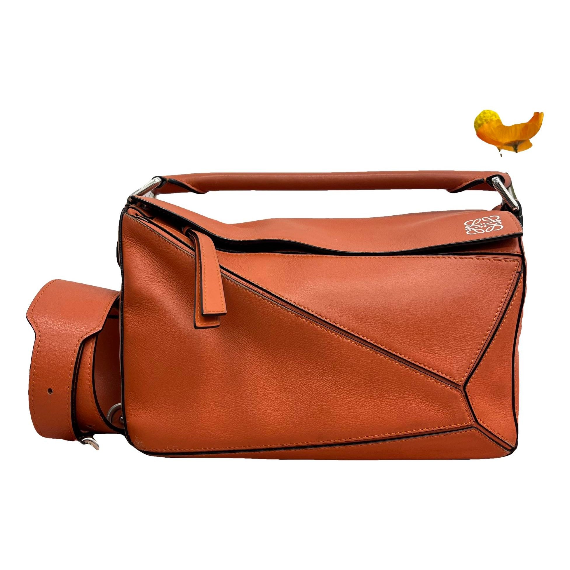 Puzzle leather handbag