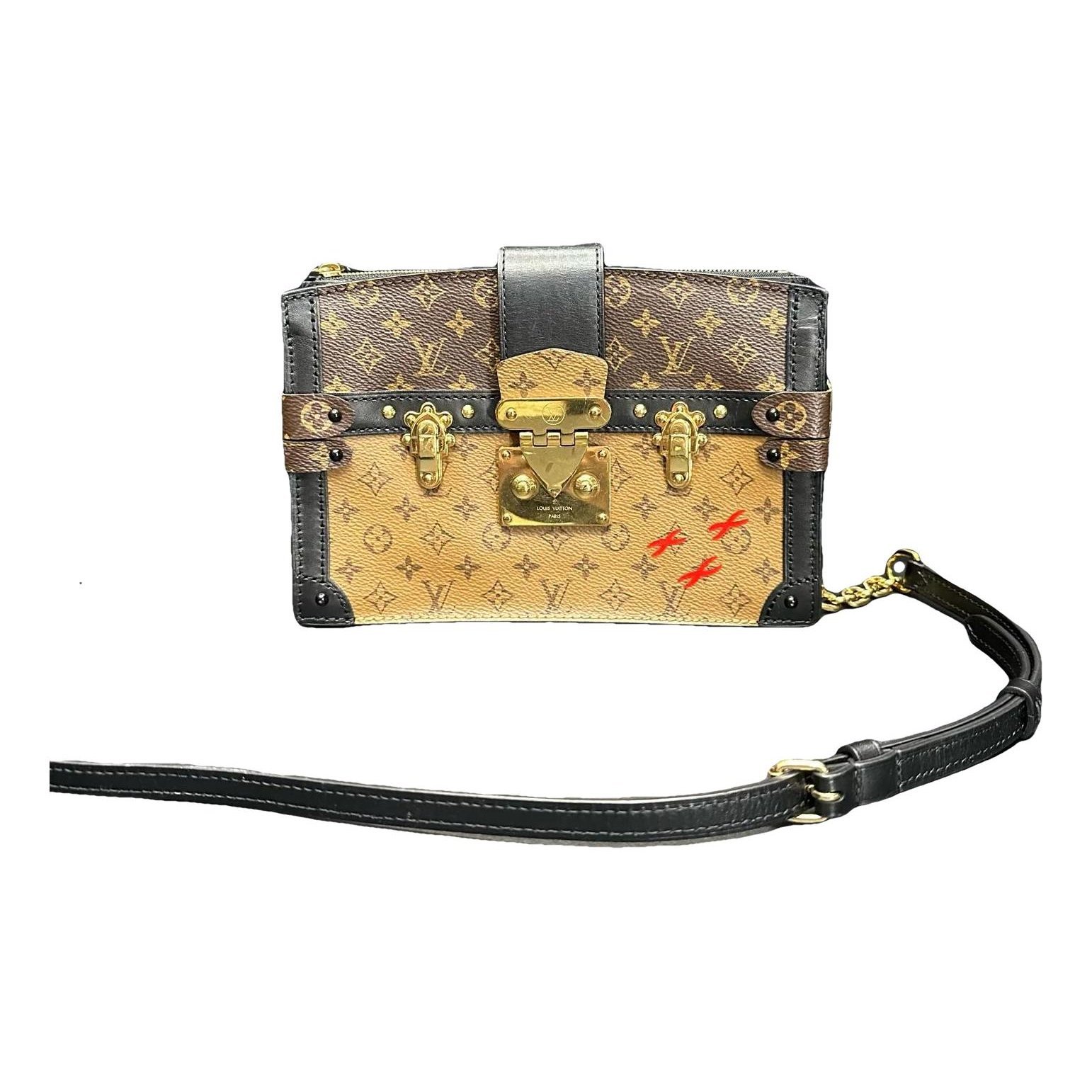 Pochette Trunk leather mini bag