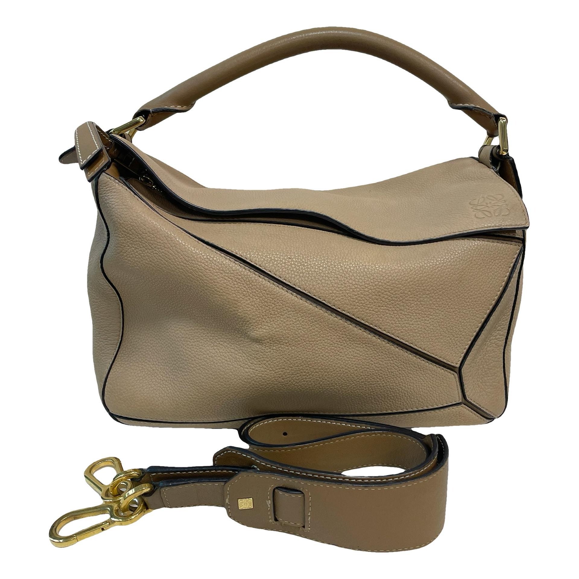 Puzzle leather handbag