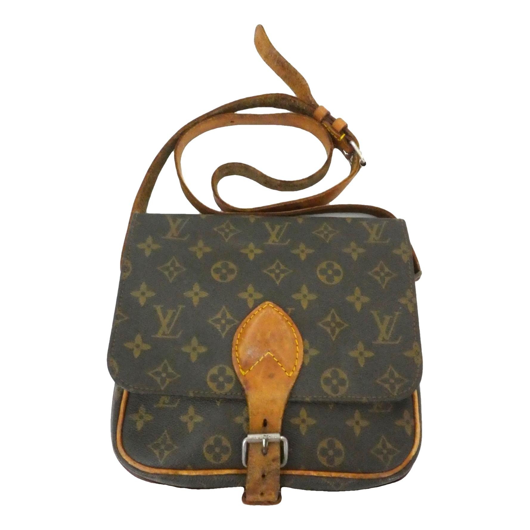 Cartouchière leather handbag