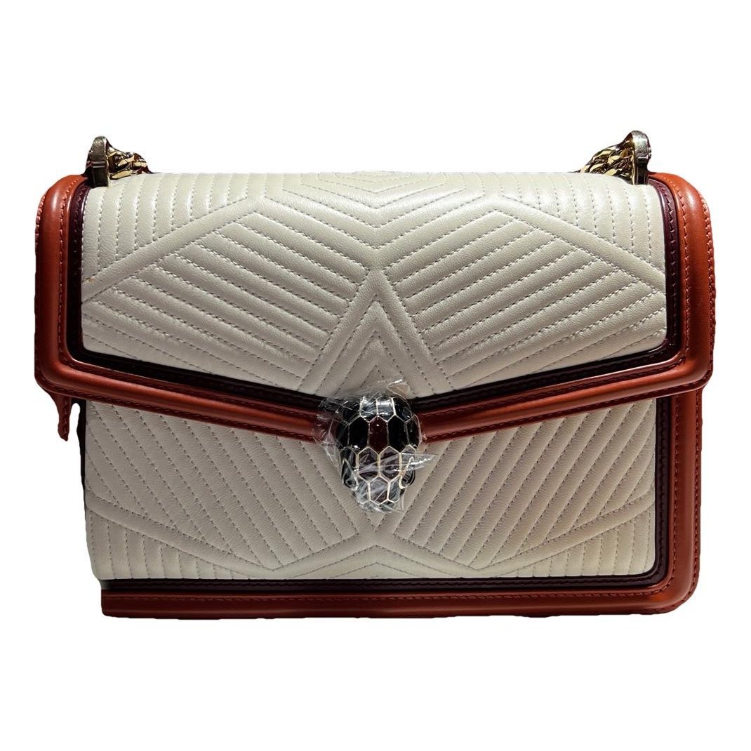 Serpenti leather handbag