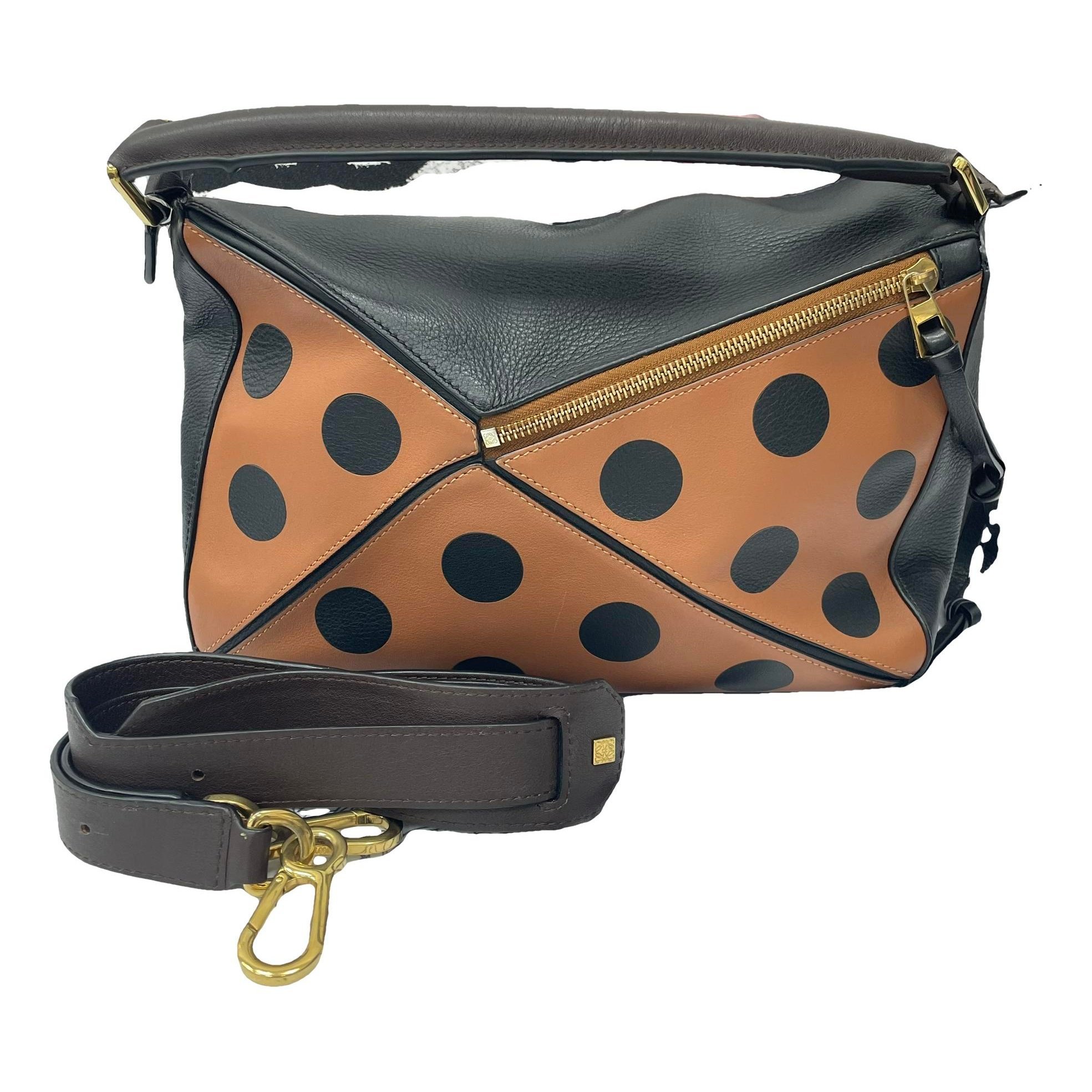 Puzzle leather handbag