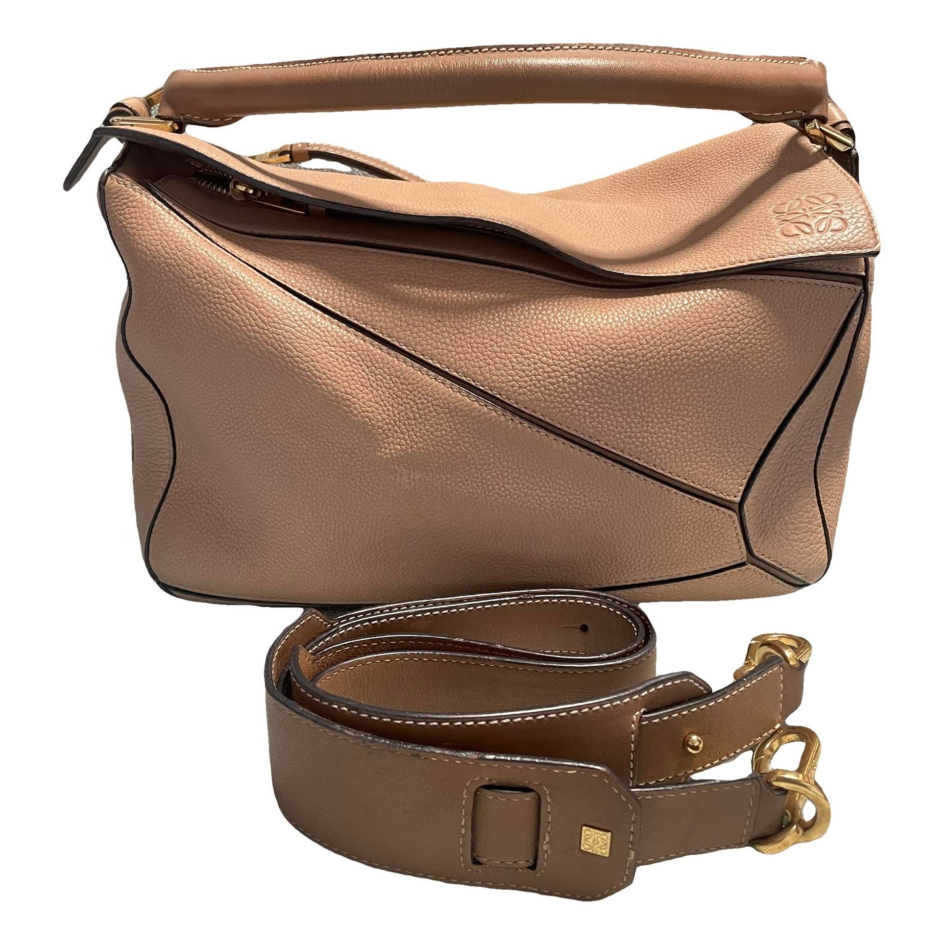 Puzzle leather handbag