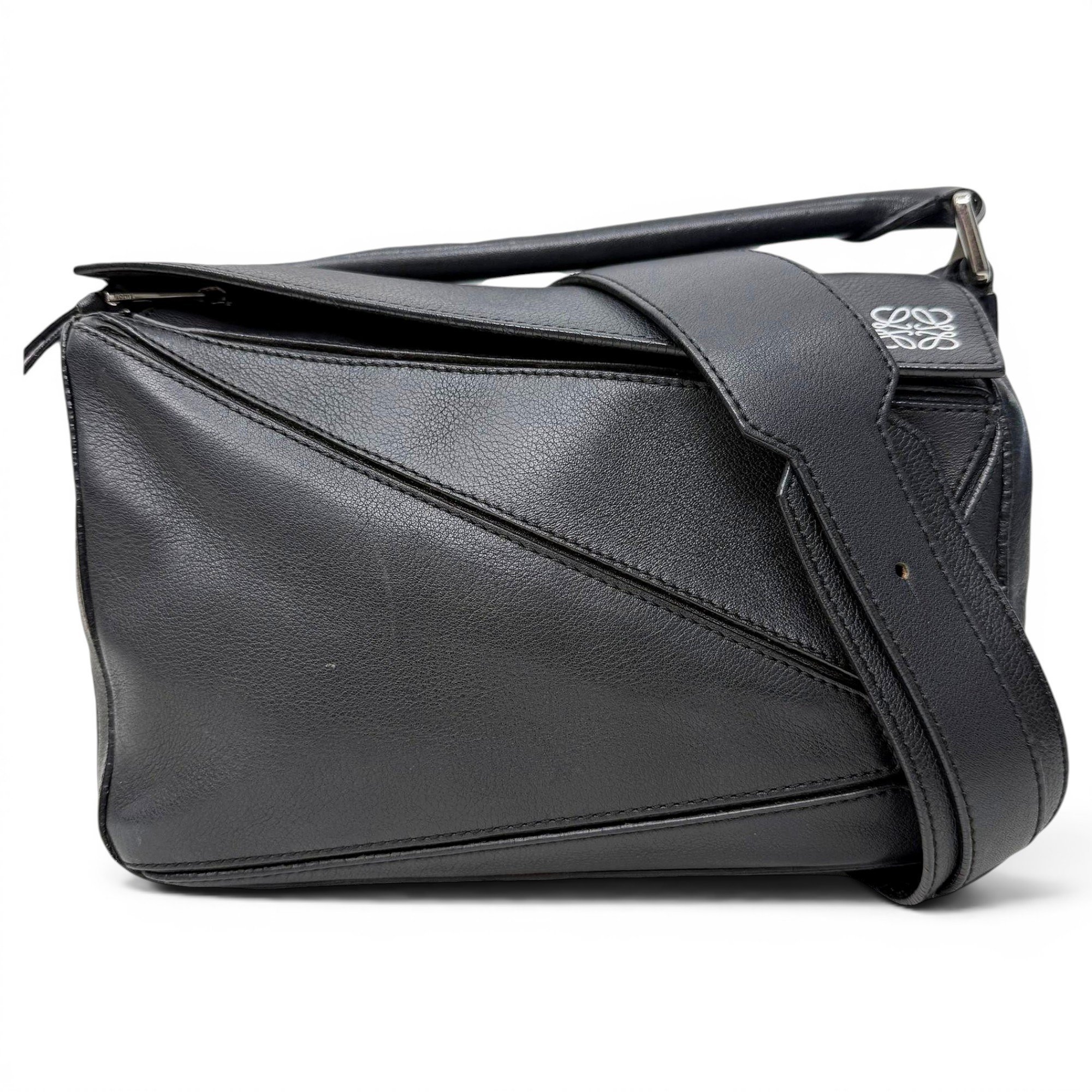 Puzzle leather handbag