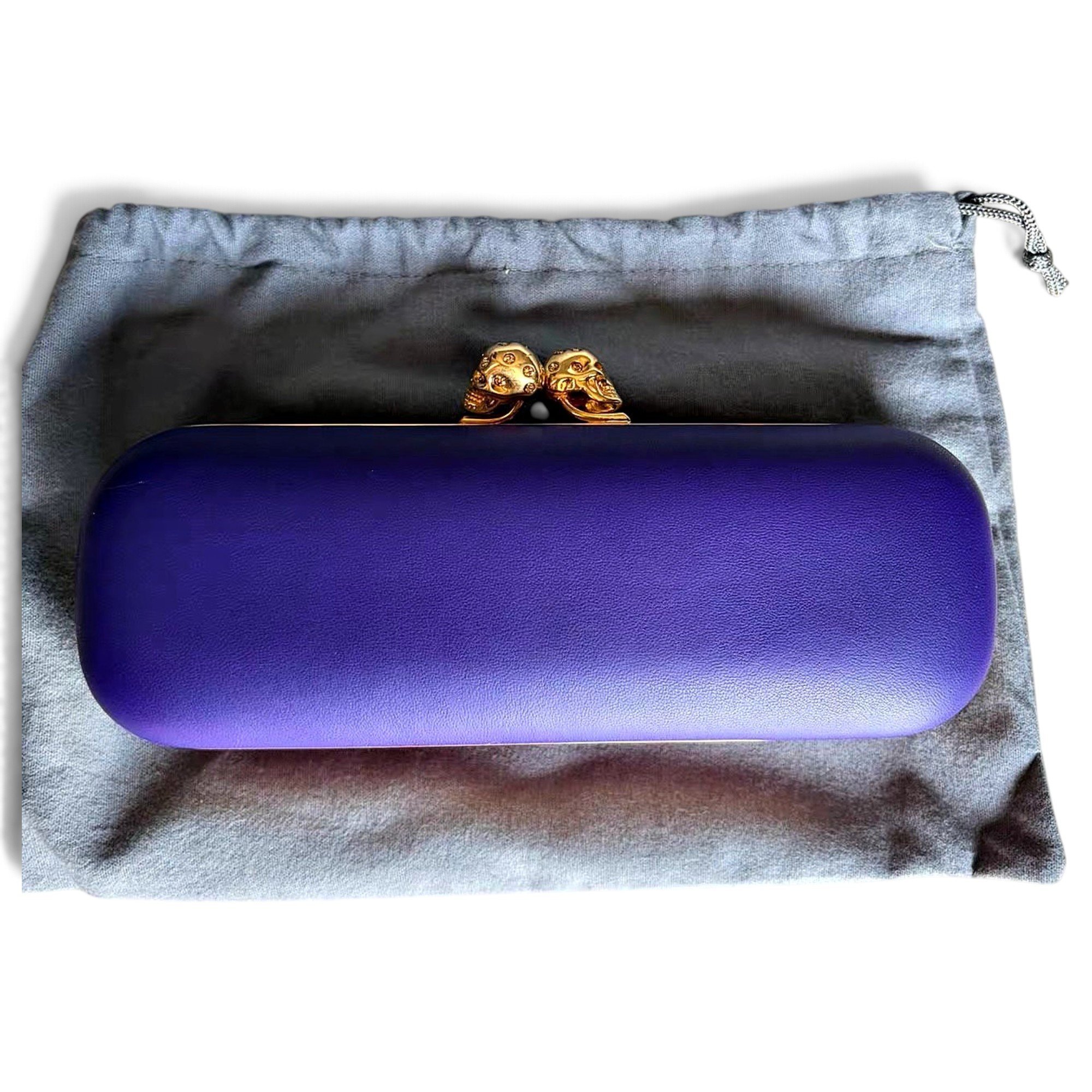 Knuckle leather clutch bag