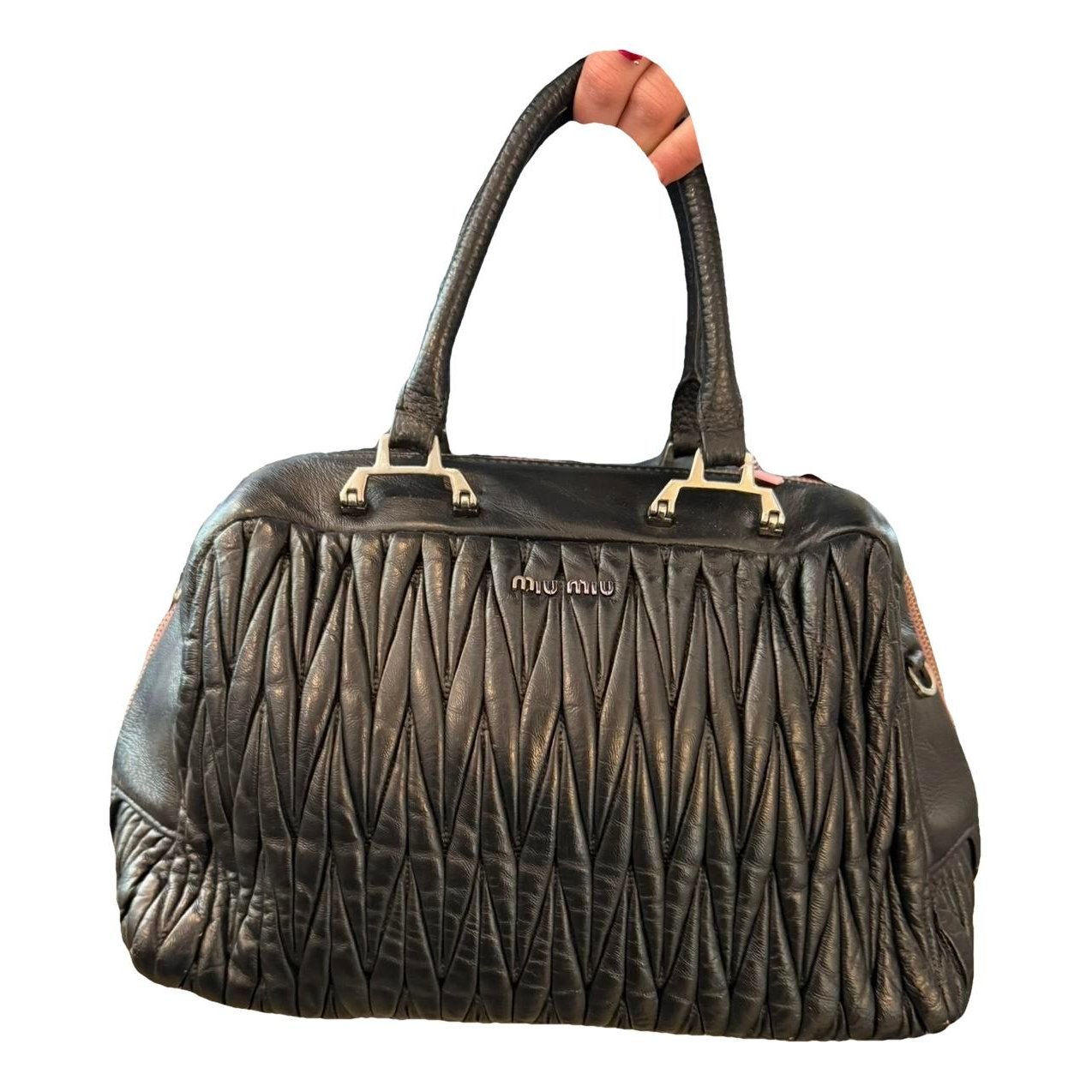 Matelassé leather handbag