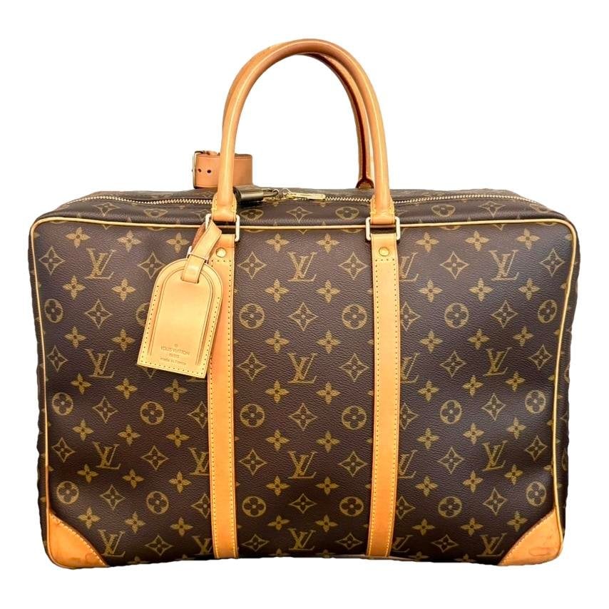 Sirius patent leather travel bag
