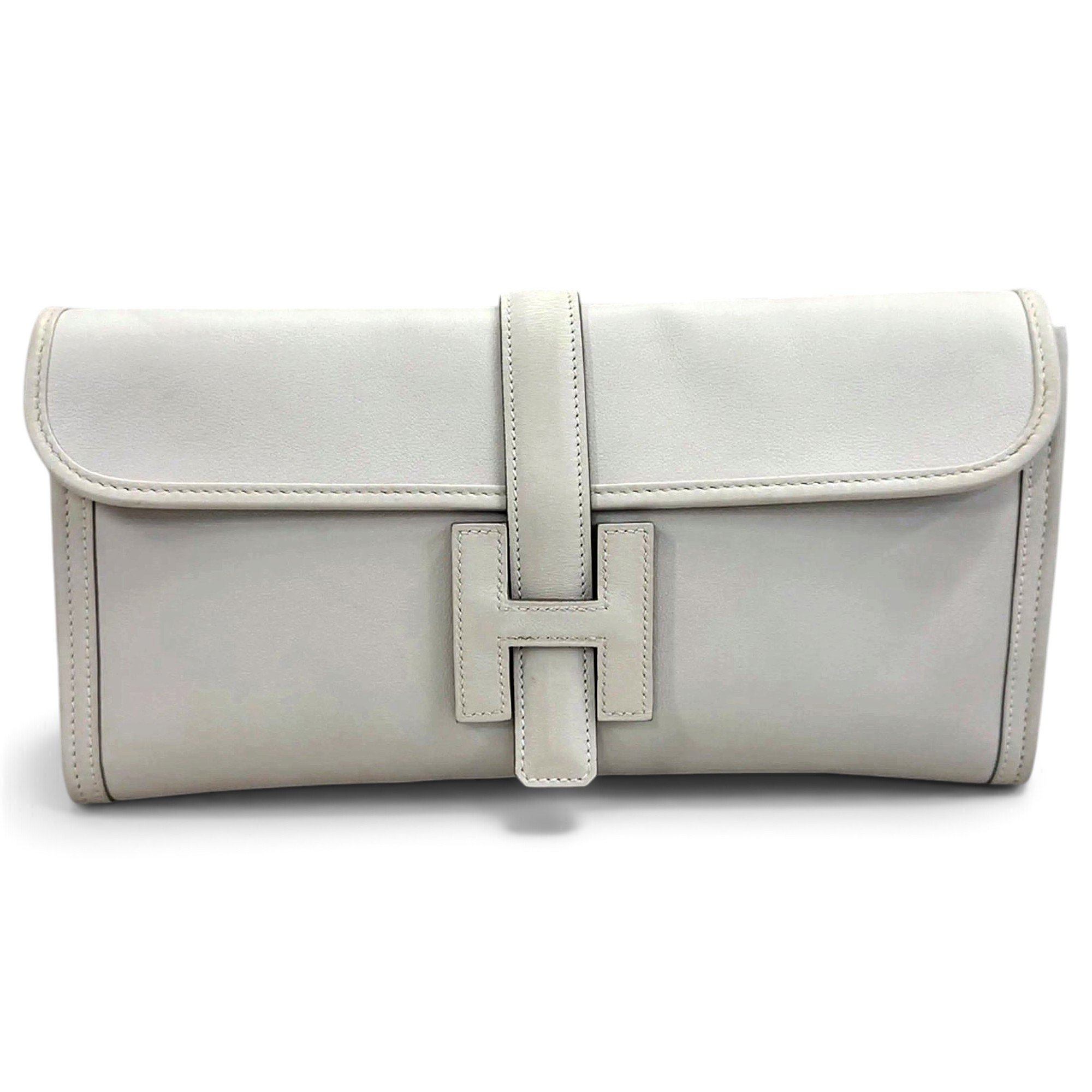 Jige leather clutch bag
