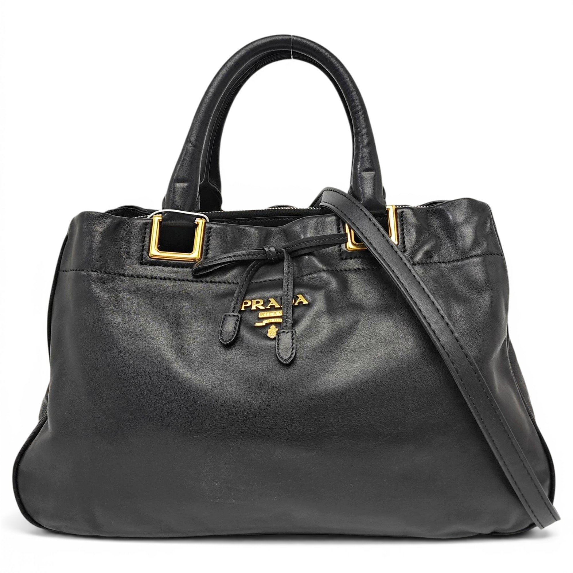 Buckle leather handbag