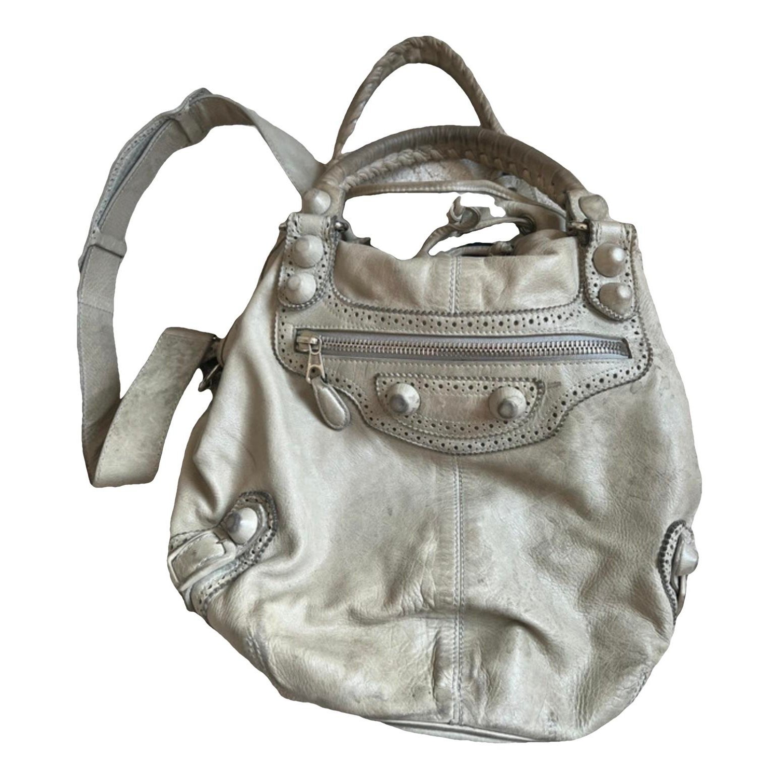 Pompon leather handbag