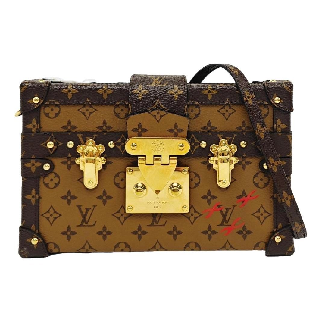 Petite Malle leather handbag