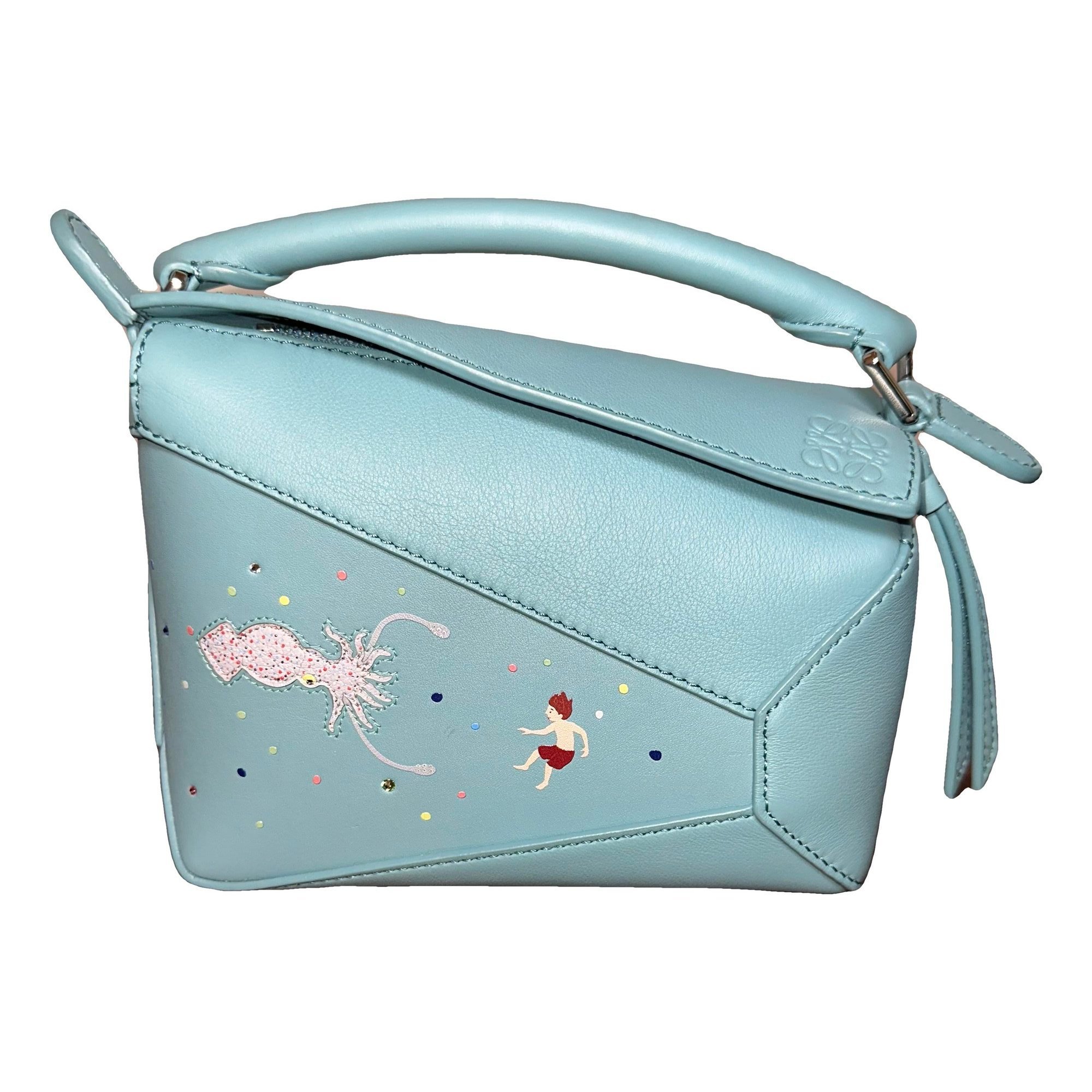 Puzzle leather handbag