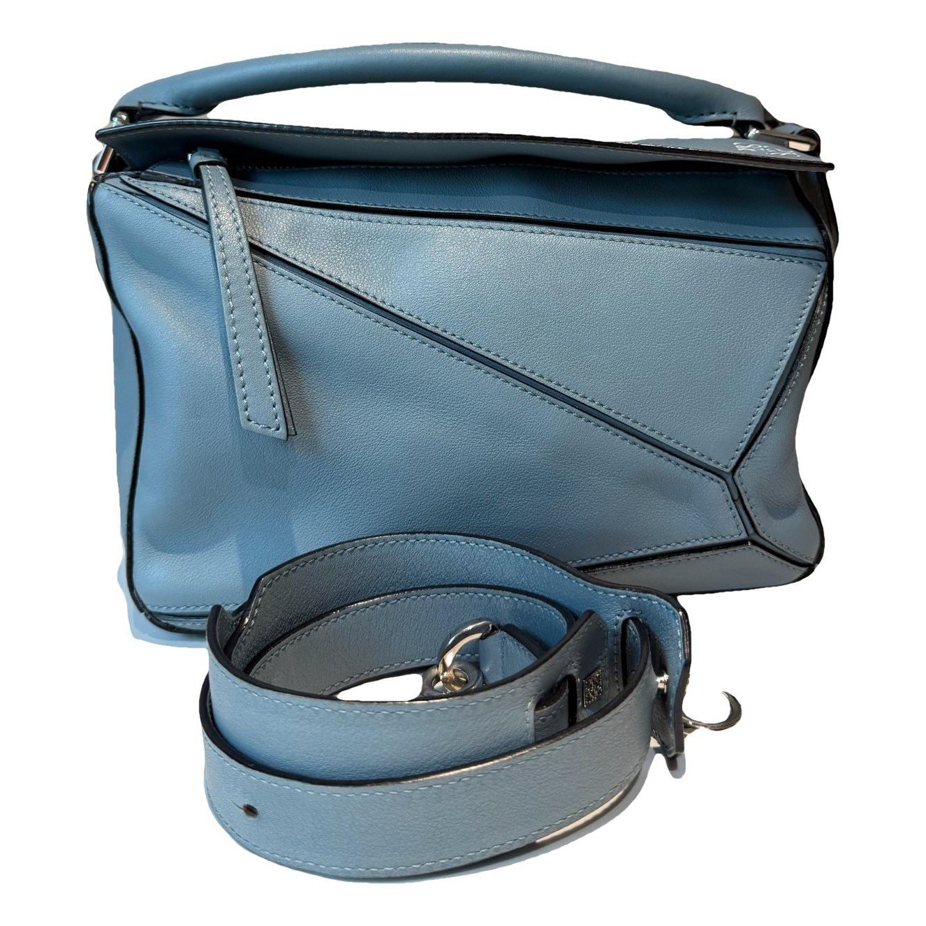Puzzle leather handbag