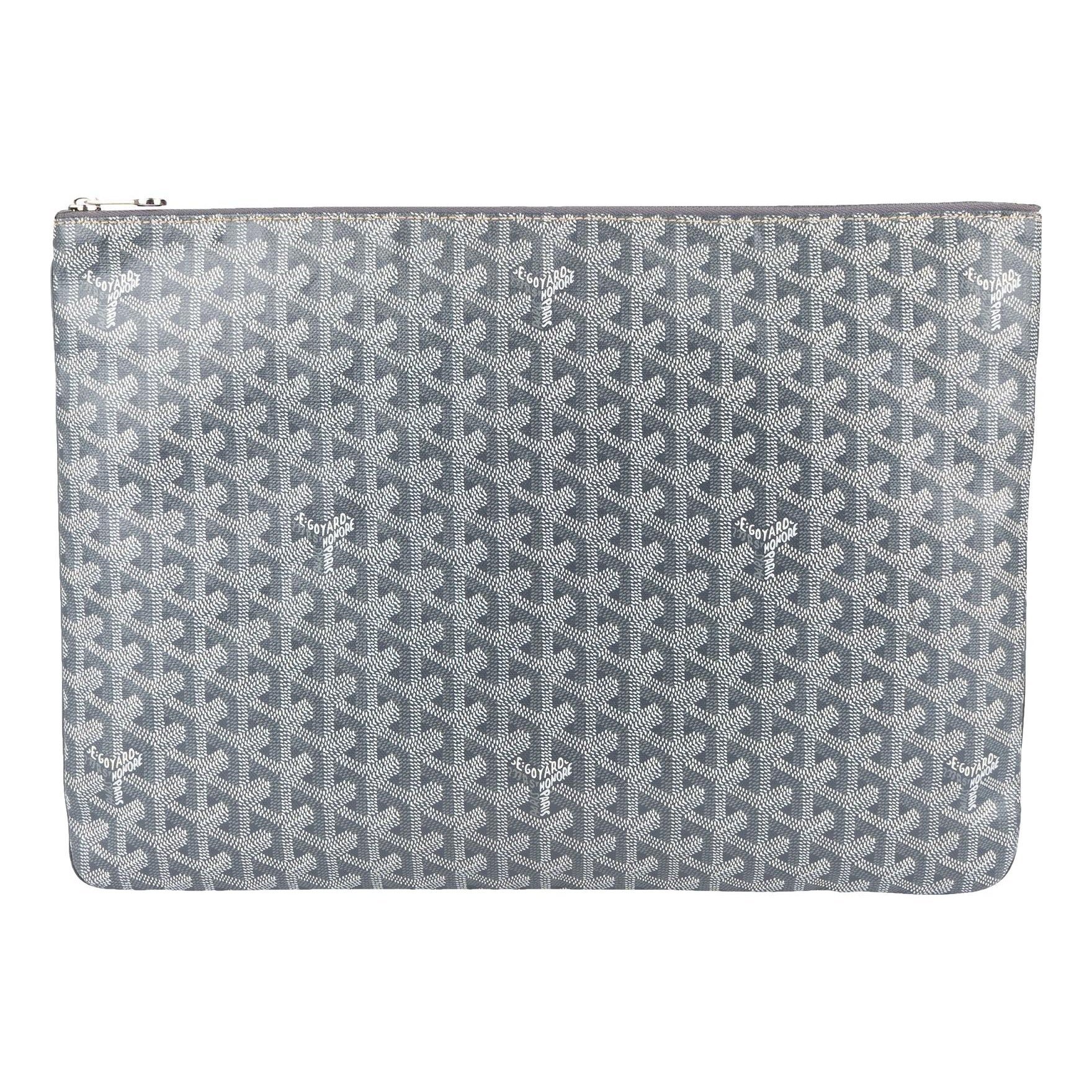 Goyard Sénat leather clutch bag