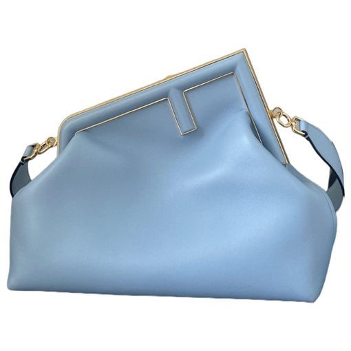 First leather handbag